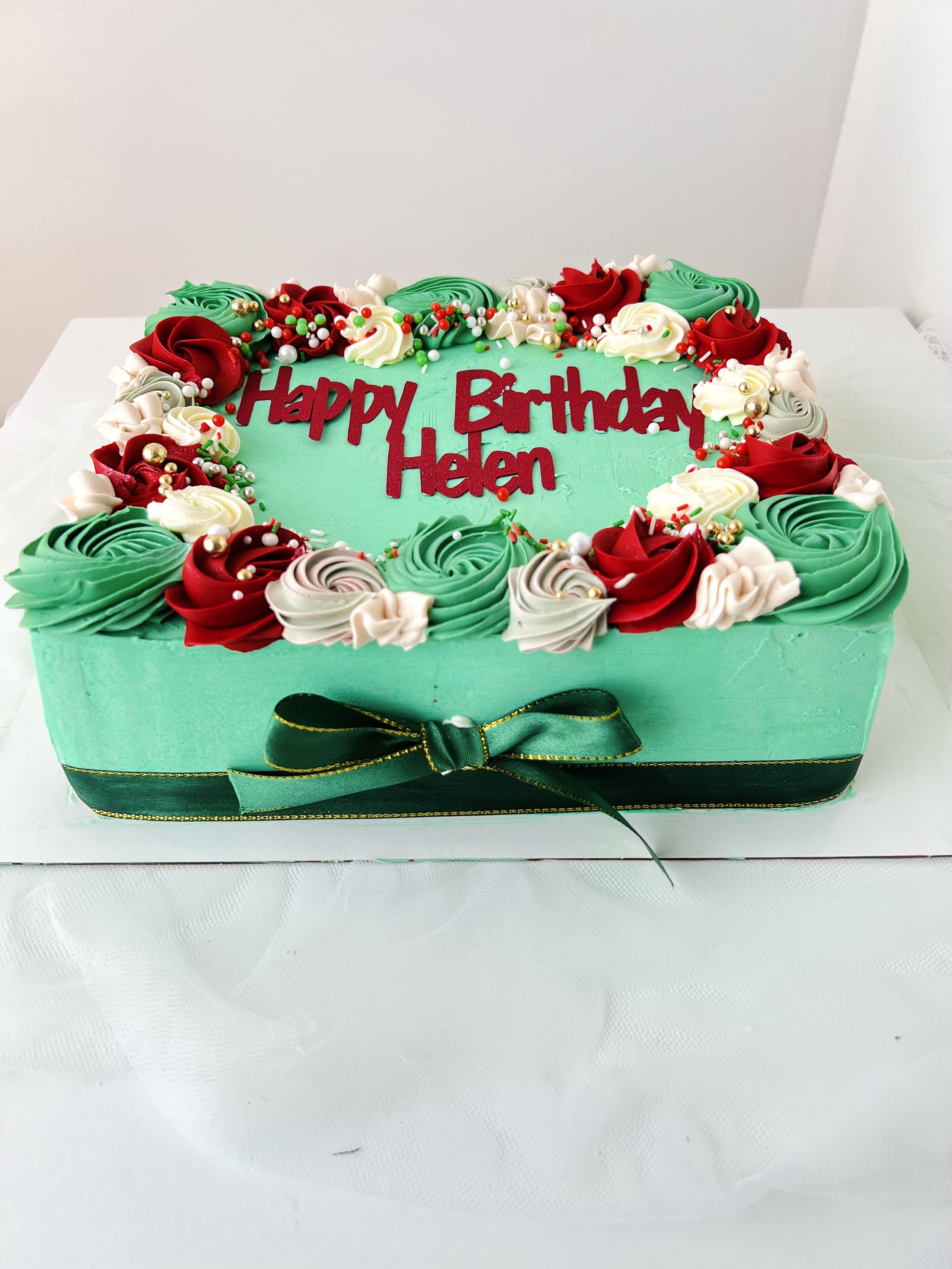 Side view of the Green Christmas Sheet Cake by Sensational Cakes and Desserts. Merry Christmas.