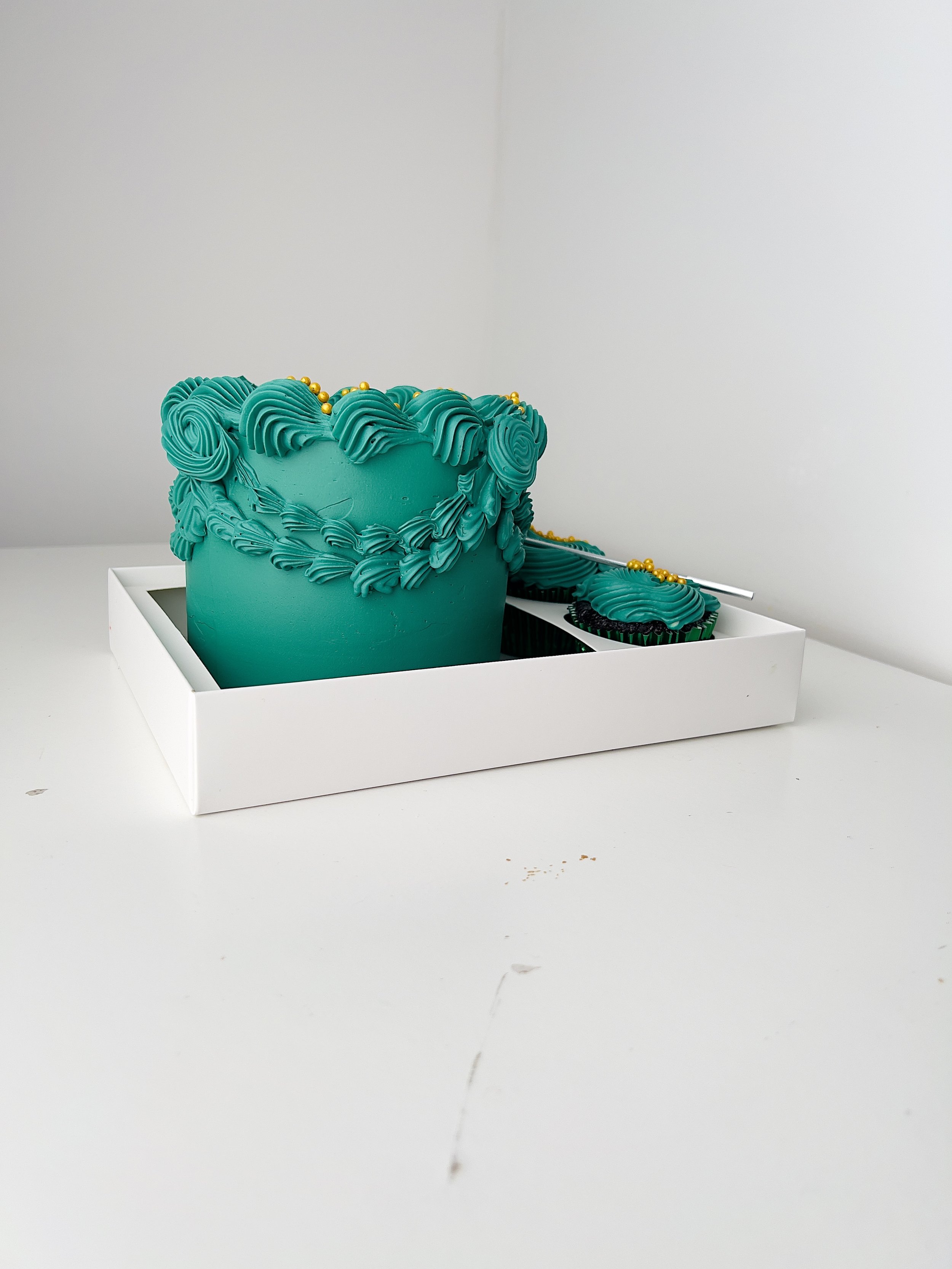 Left side view of the Emerald Green Bento Cake & Cupcake Set by Sensational Cake and Desserts