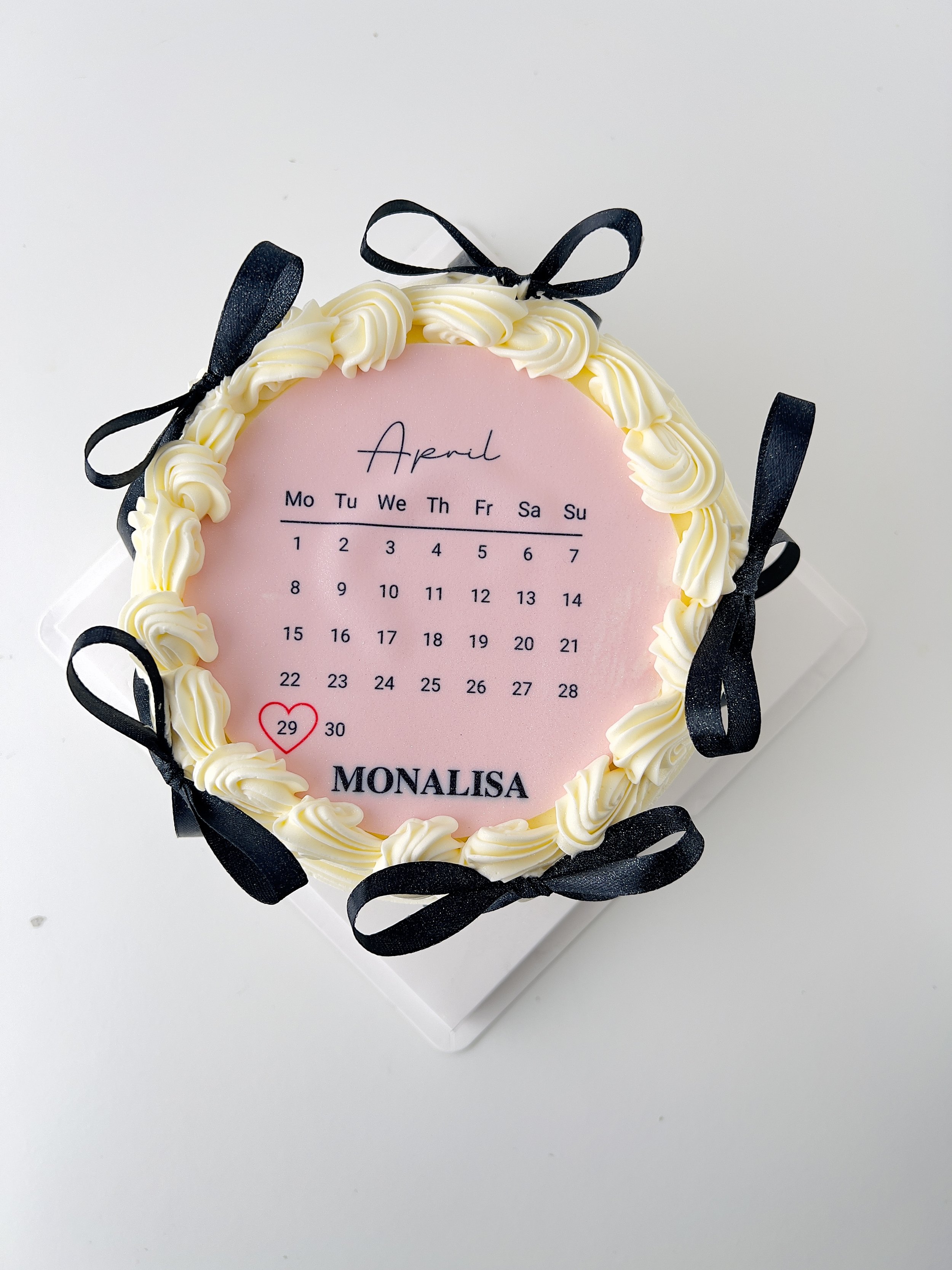 Top view of the Mini Calendar Birthday Cake with Black Ribbon by Sensational Cakes and Desserts
