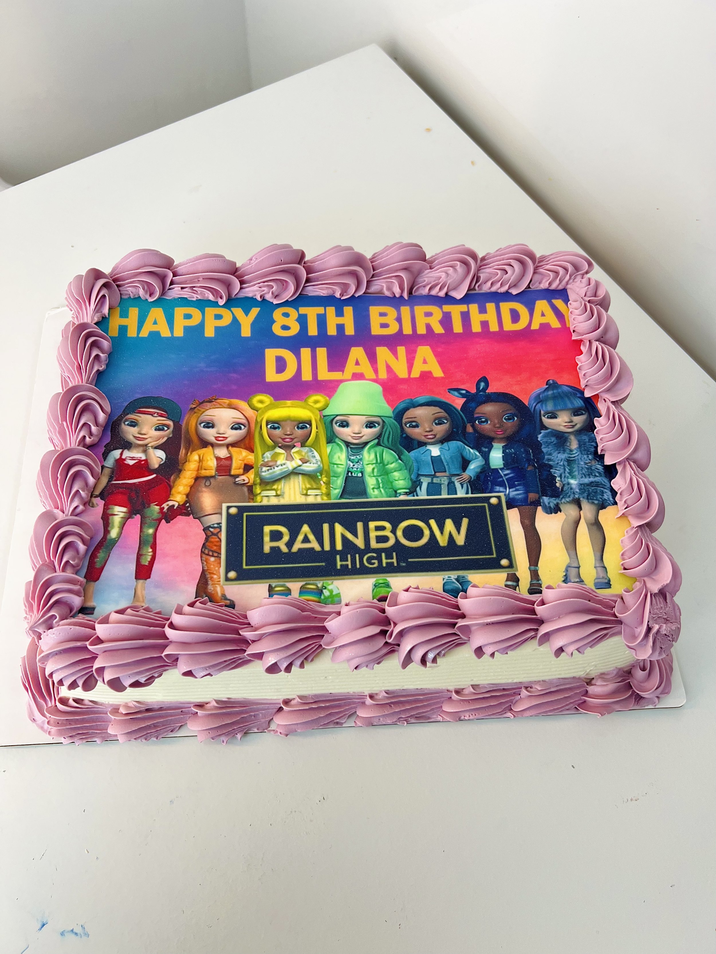 Rainbow High Cartoon Character Sheet Cake by Sensational Cakes and Desserts.