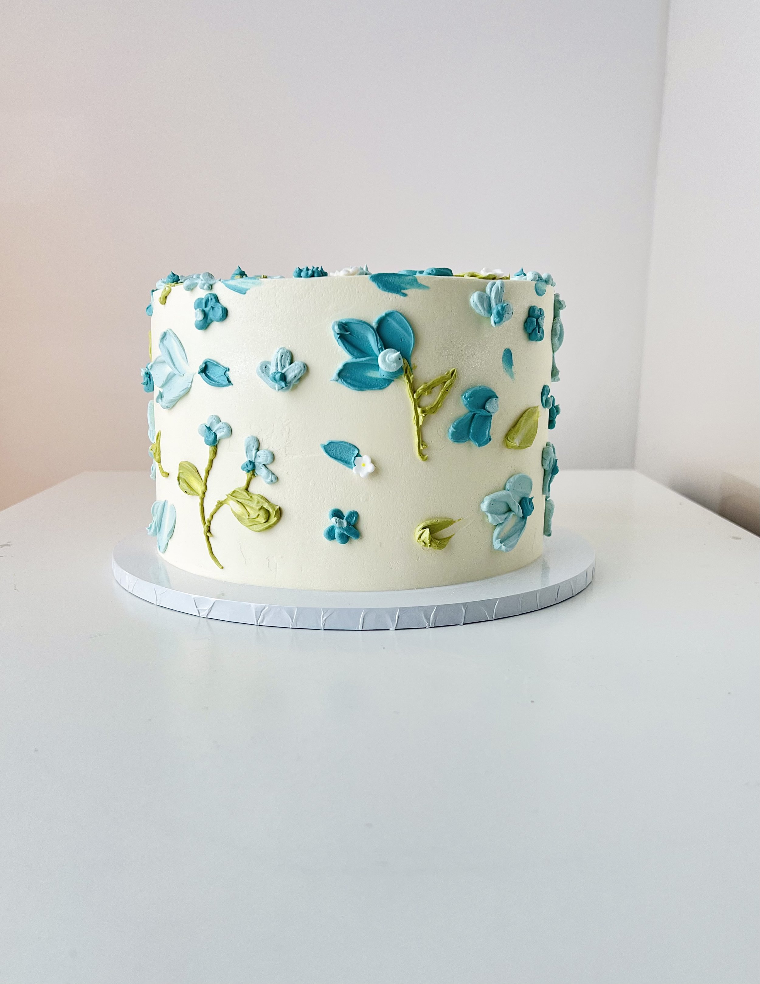 Side view of the Pallet-Painted Midi Cake by Sensational Cakes and Desserts