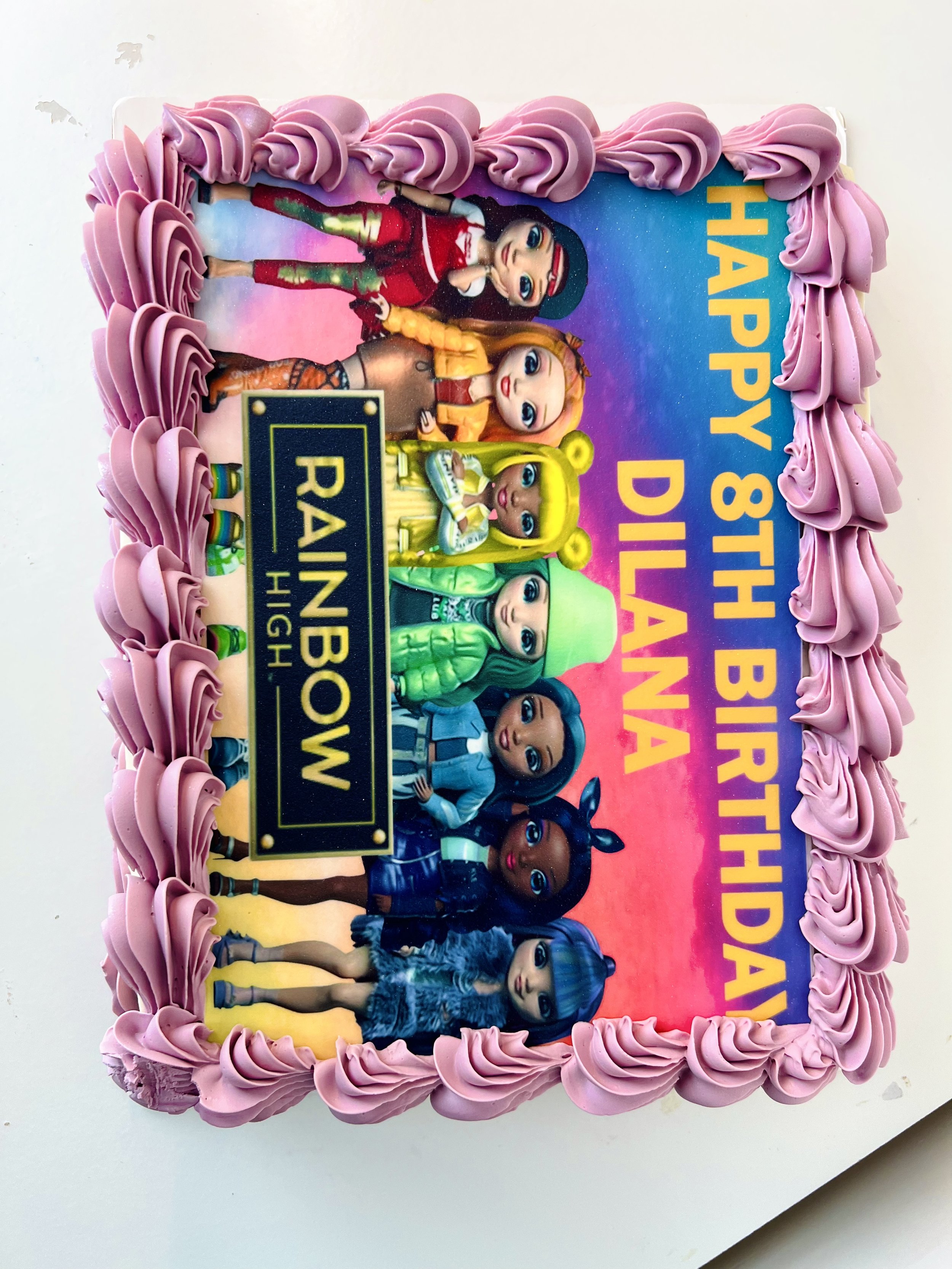 Rainbow High Cartoon Character Sheet Cake by Sensational Cakes and Desserts.