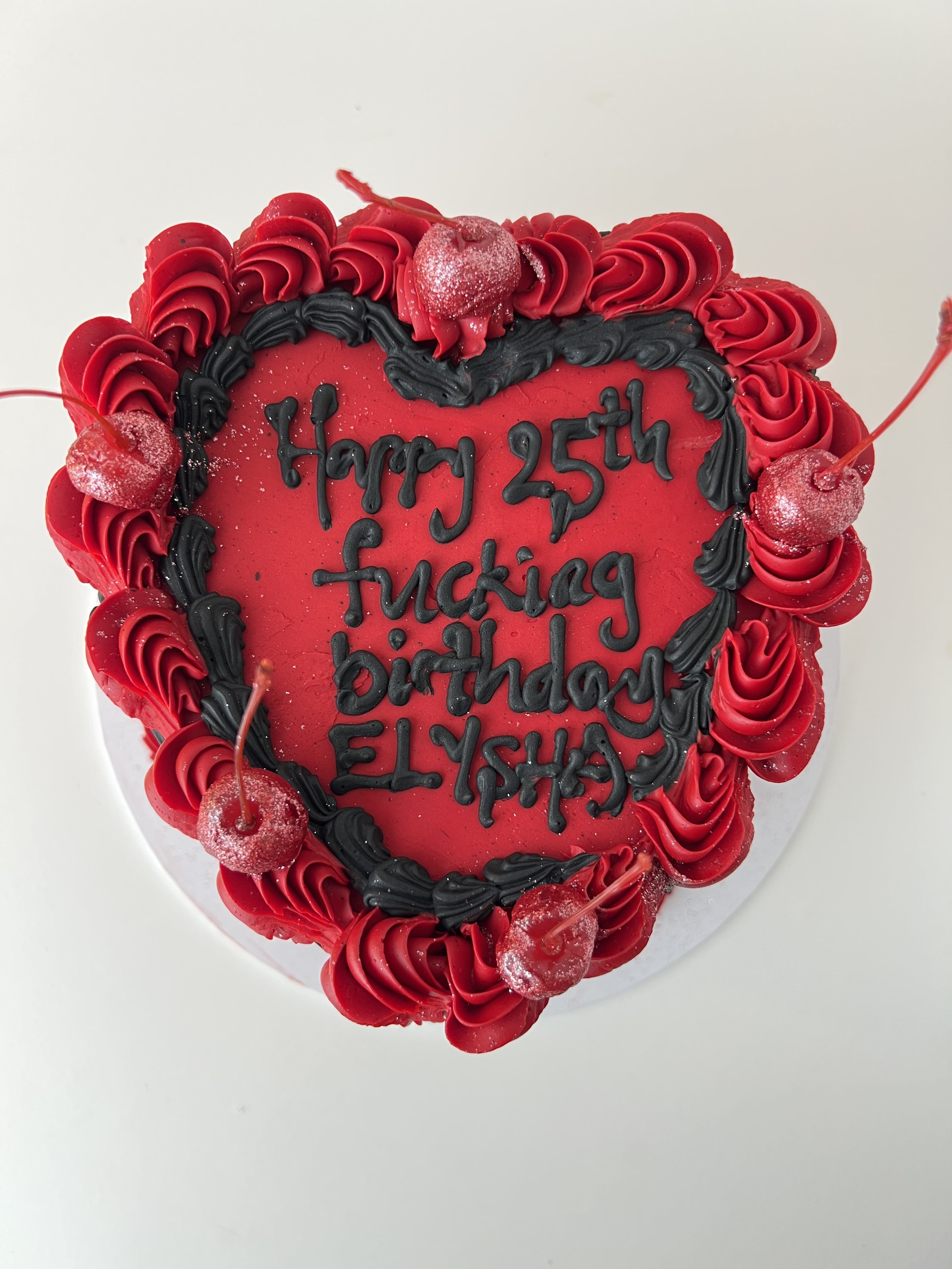 Top view of the Red and Black Vintage Heart Cake by Sensational Cakes and Desserts.