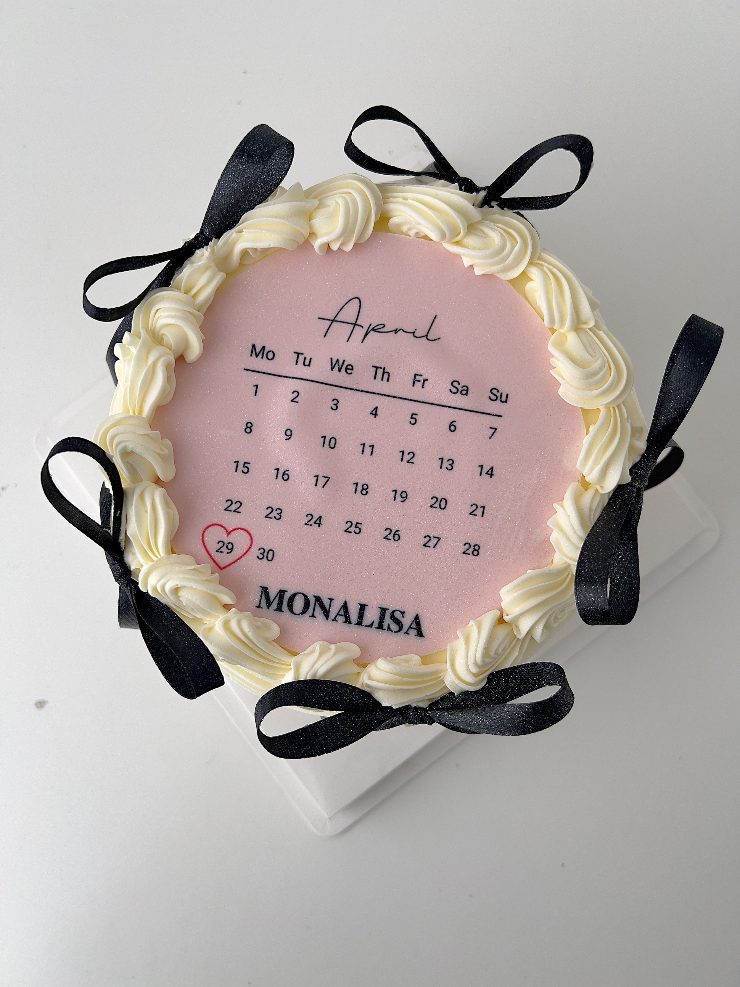 Top view of the Mini Calendar Birthday Cake with Black Ribbon by Sensational Cakes and Desserts