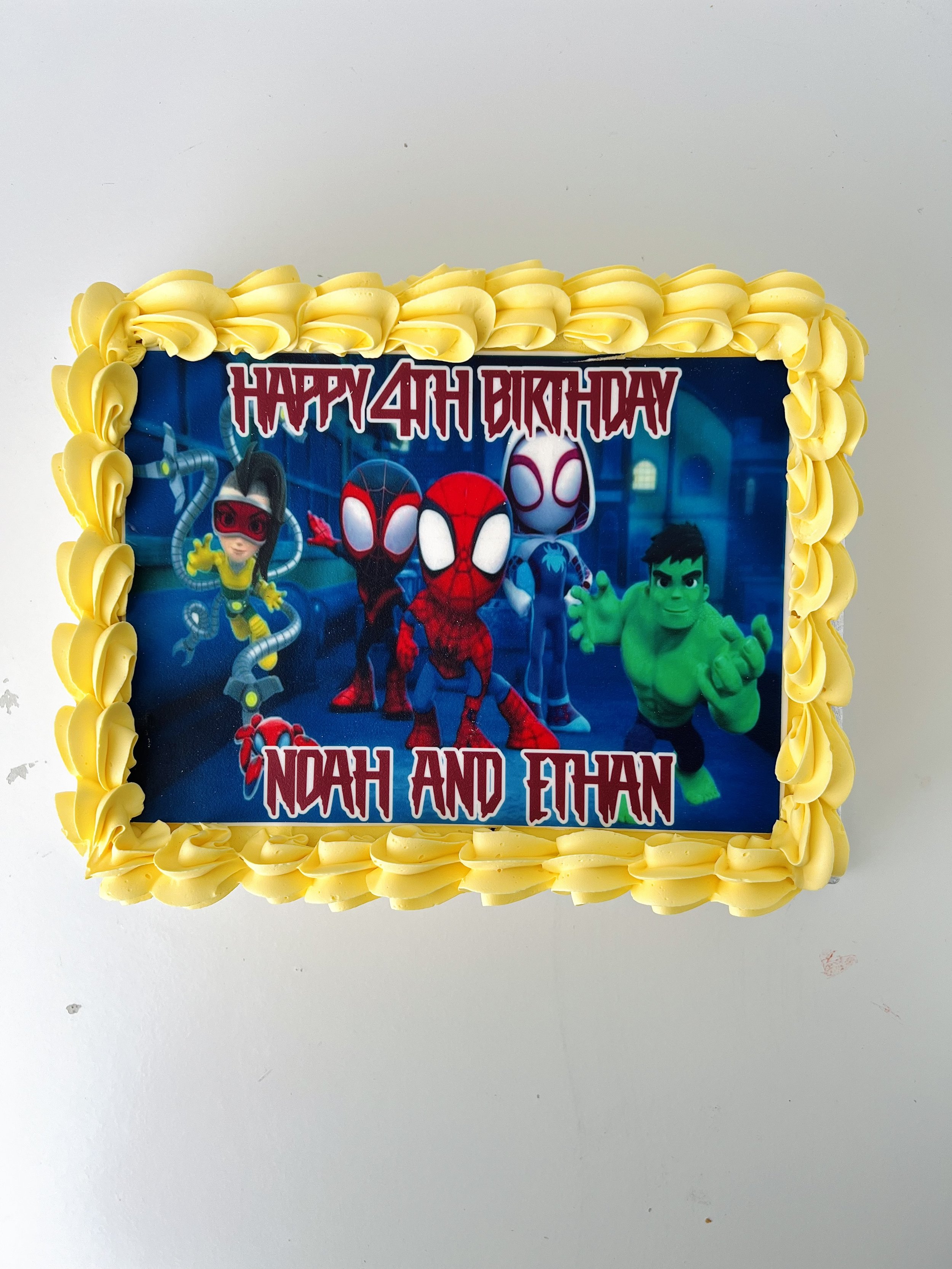 Top view of the Spiderman Character Sheet Cake by Sensational Cakes and Desserts