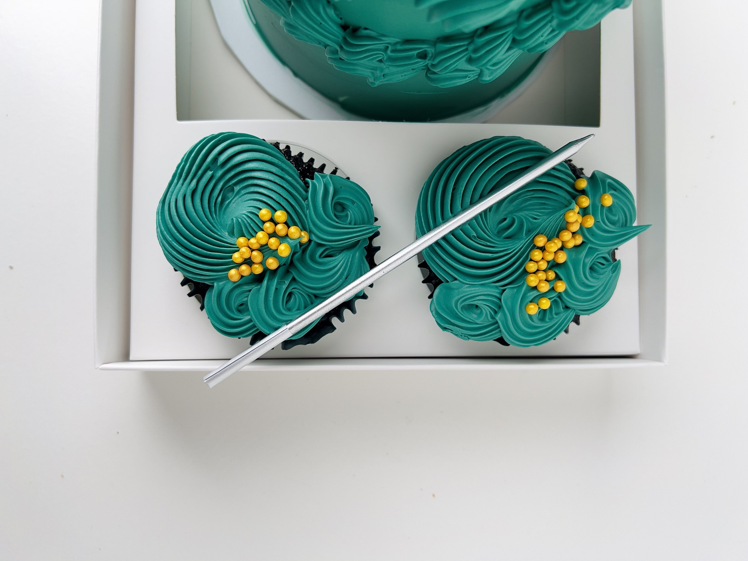 Matching Emerald Green Cupcakes with Candle by Sensational Cakes and Desserts
