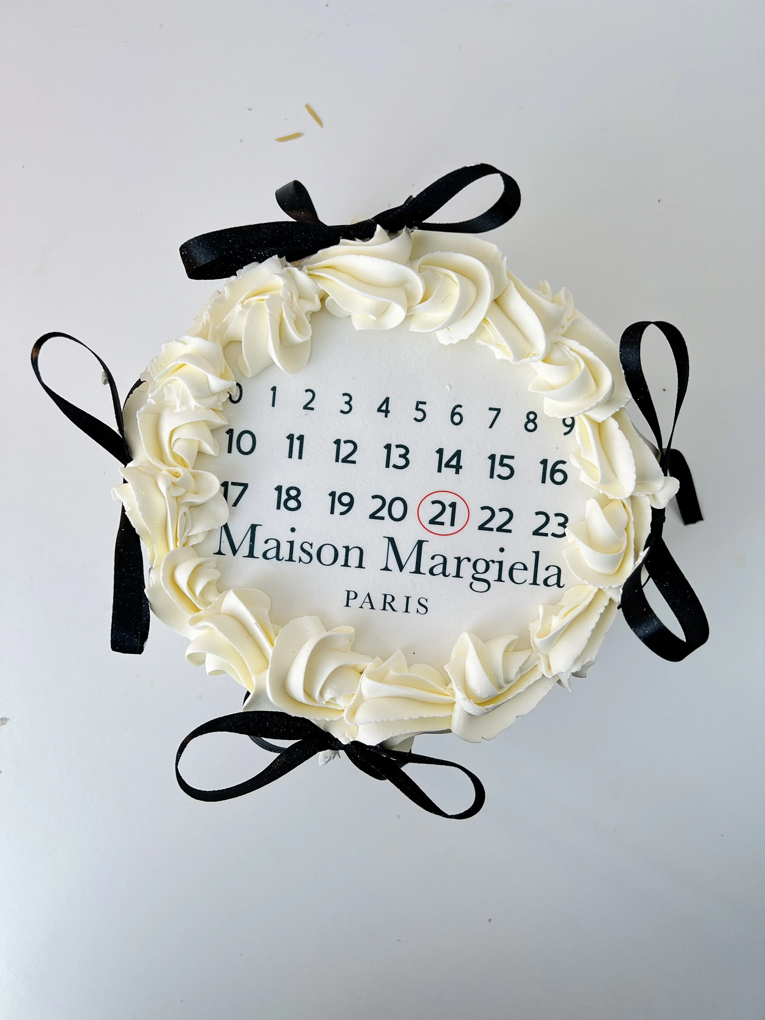 Top view of the Age Number Black Ribbon Mini Cake