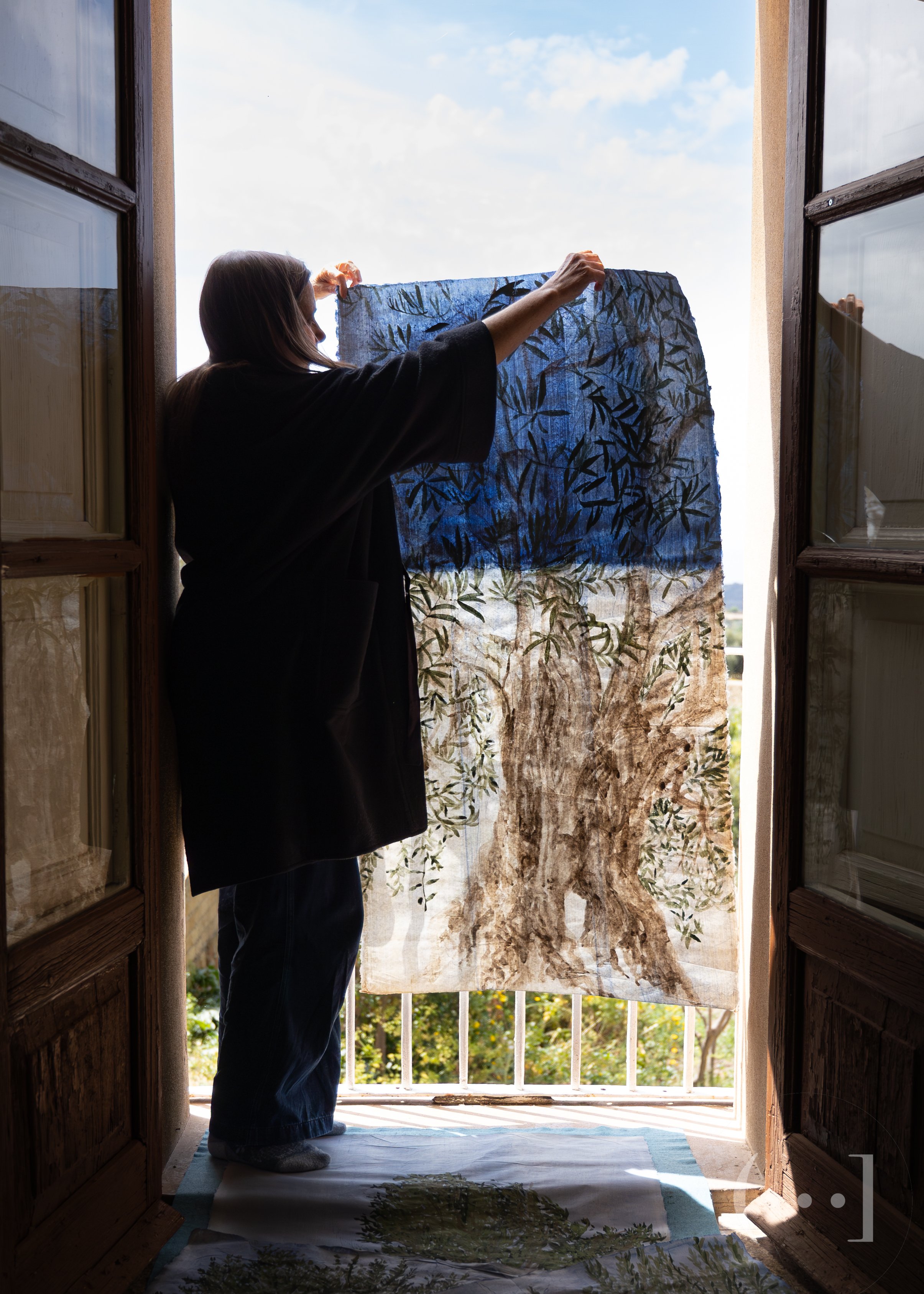 Anne with banner painted in pigment on handmade Mitsumata paper from Japan.
