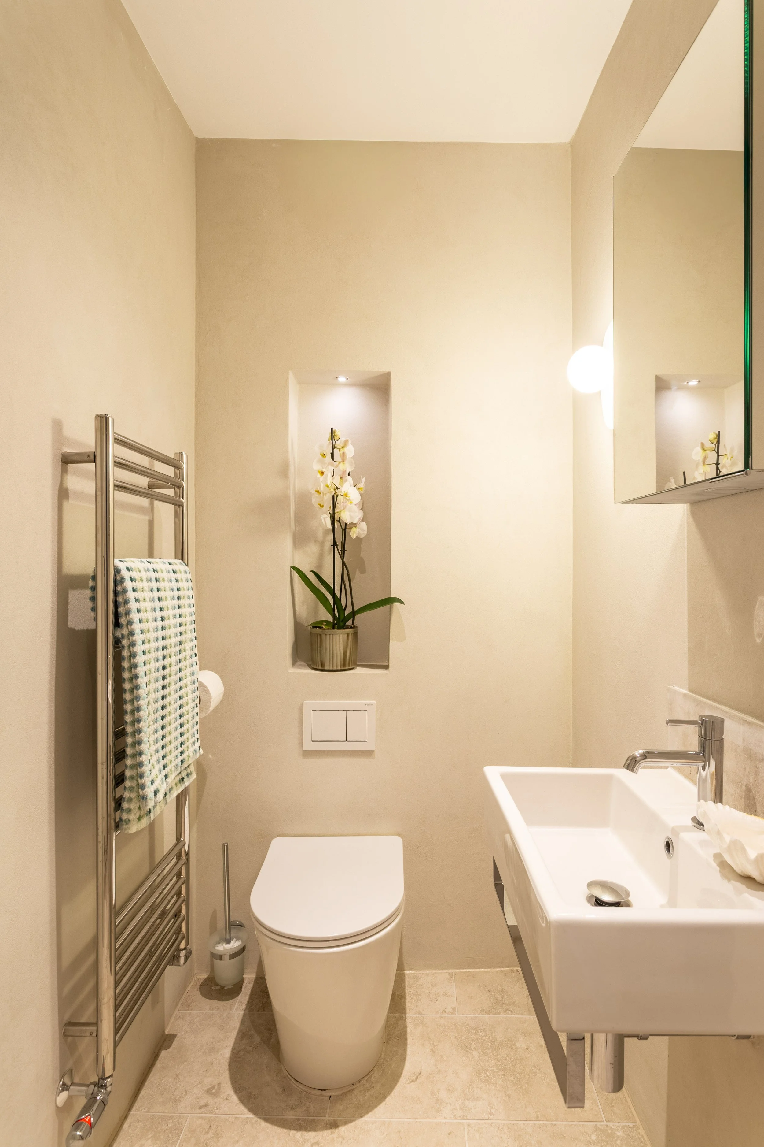 Minimal cloakroom with microcement finish.jpg