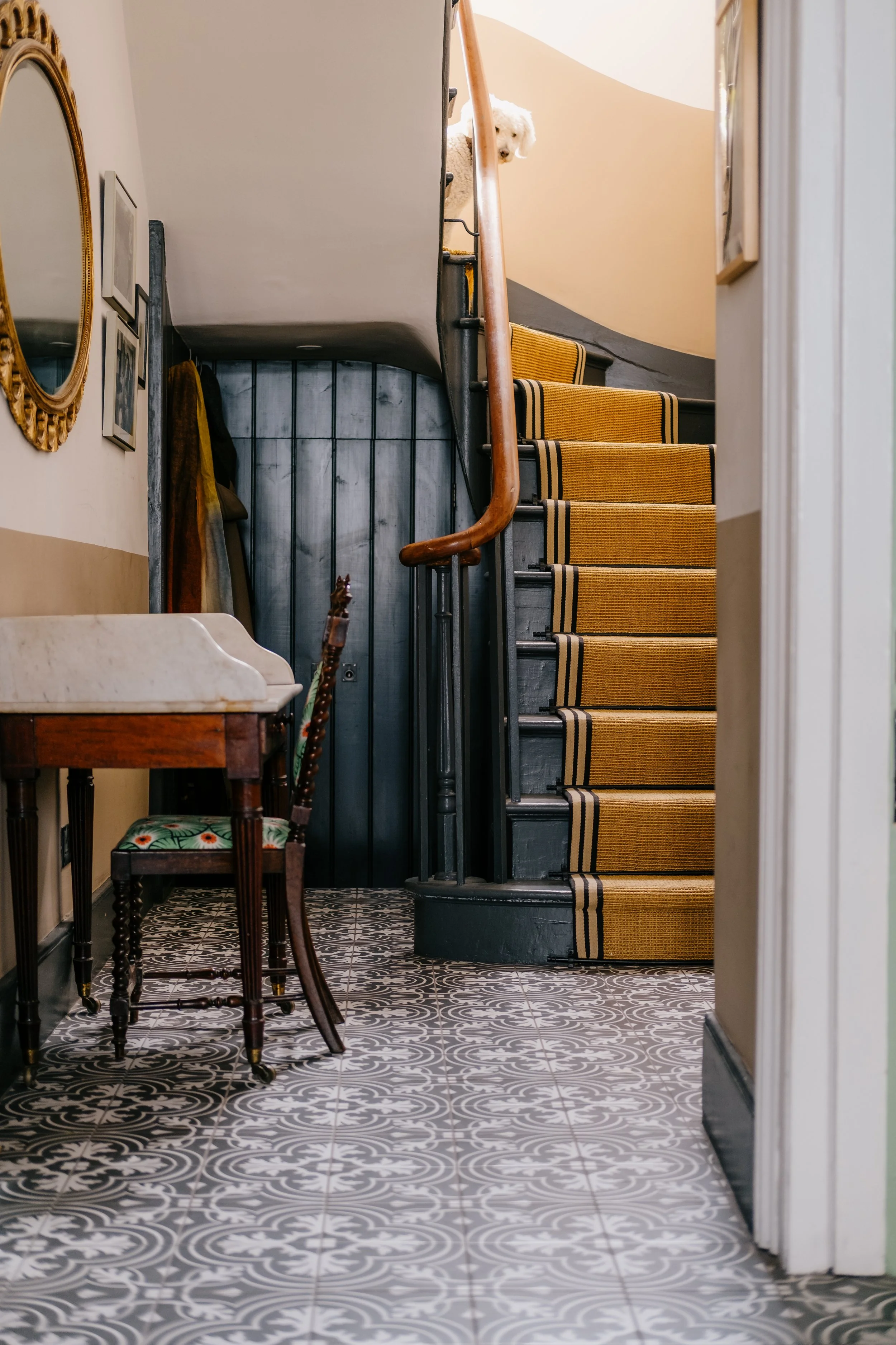 Hallway with tiled floor and dog copy.jpg