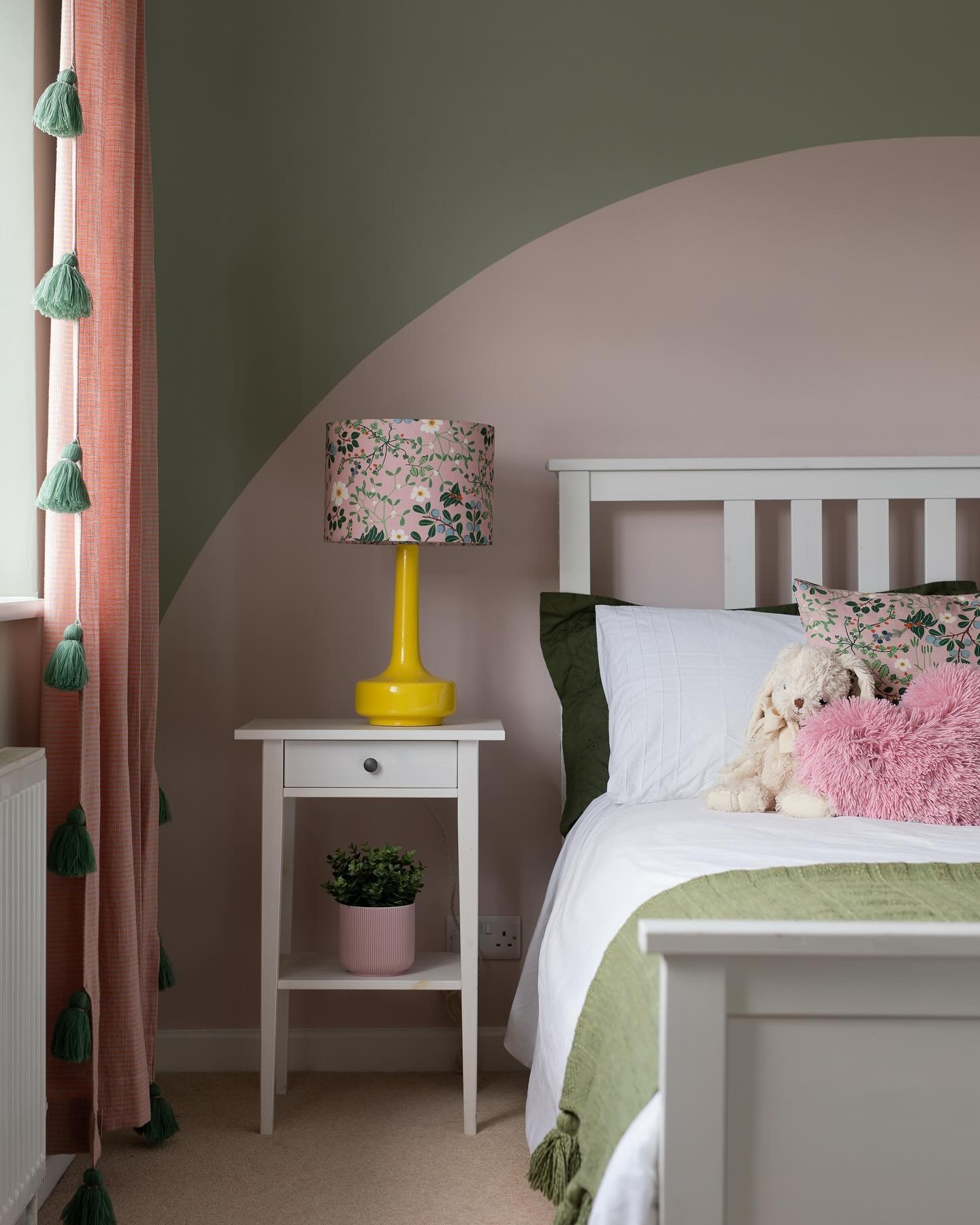 PRETTY GIRLS BEDROOM &bull; a pink rainbow in a soft green bedroom is the perfect palette for this creative young lady. 

Inspired by a beach sunset- we have taken some tropical elements and run with a floral theme - Rattan, Sheepskin, Fairy lights, 