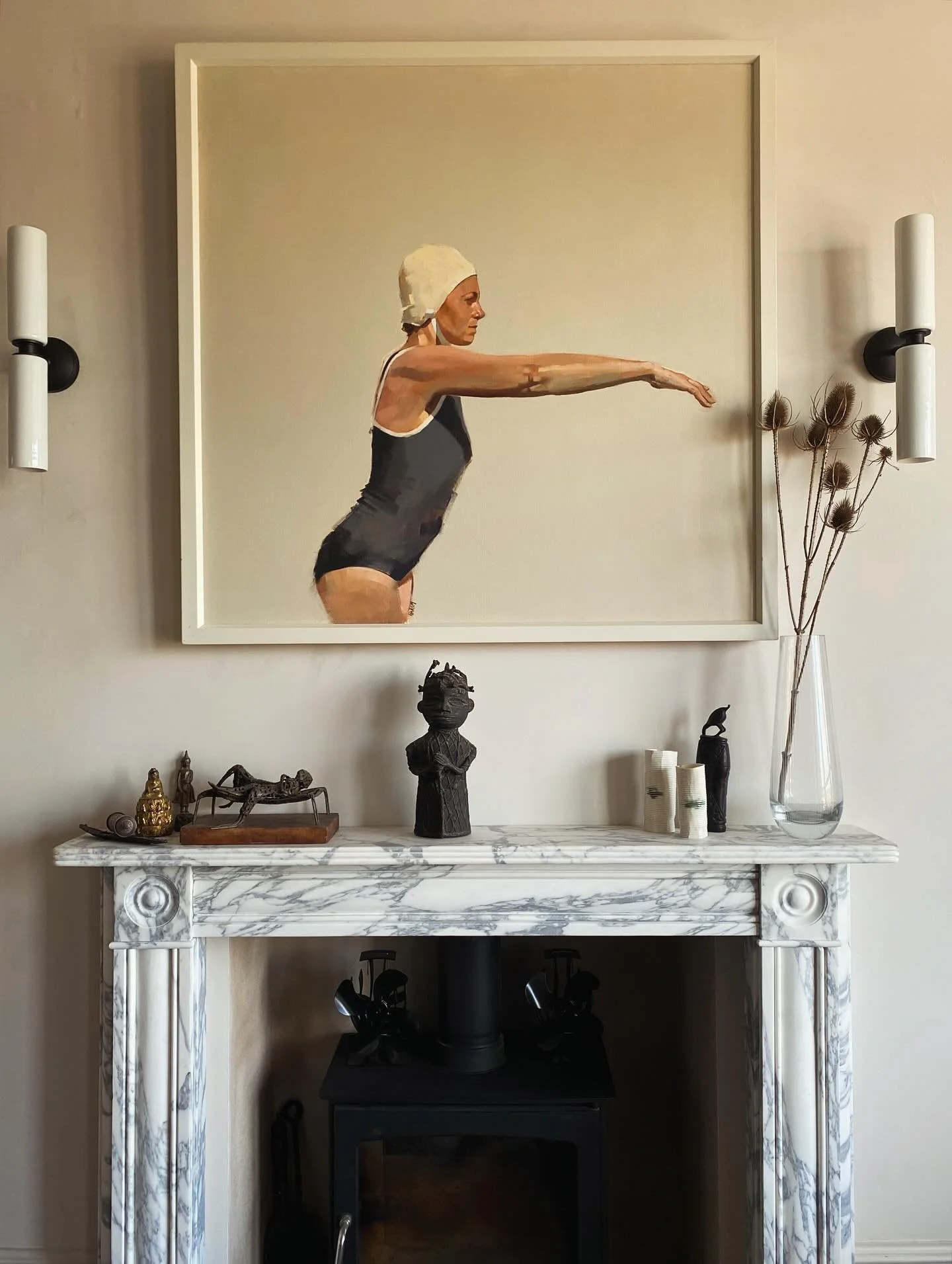 LIGHT • The afternoon light in the room is very special. Facing due West it can be warm to a bit hot depending on the season. 
This hand crafted marble fireplace is not an original feature but a sympathetic addition to the full renovation of th