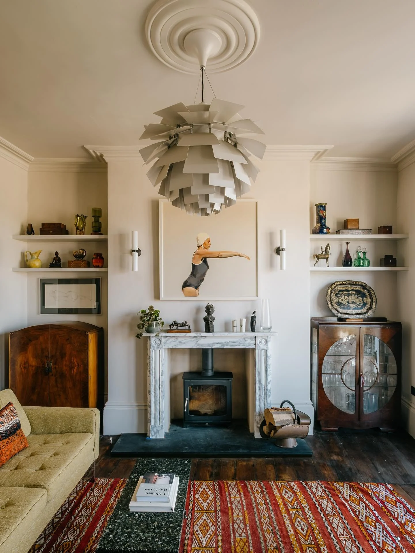 FIREPLACE • Wider shot of the previous post showing this marble fireplace in situ. Lofty Victorian living space with glorious views and fabulous sunsets. 
The two Deco cabinets are very special pieces. The dome topped tall boy is the remaining