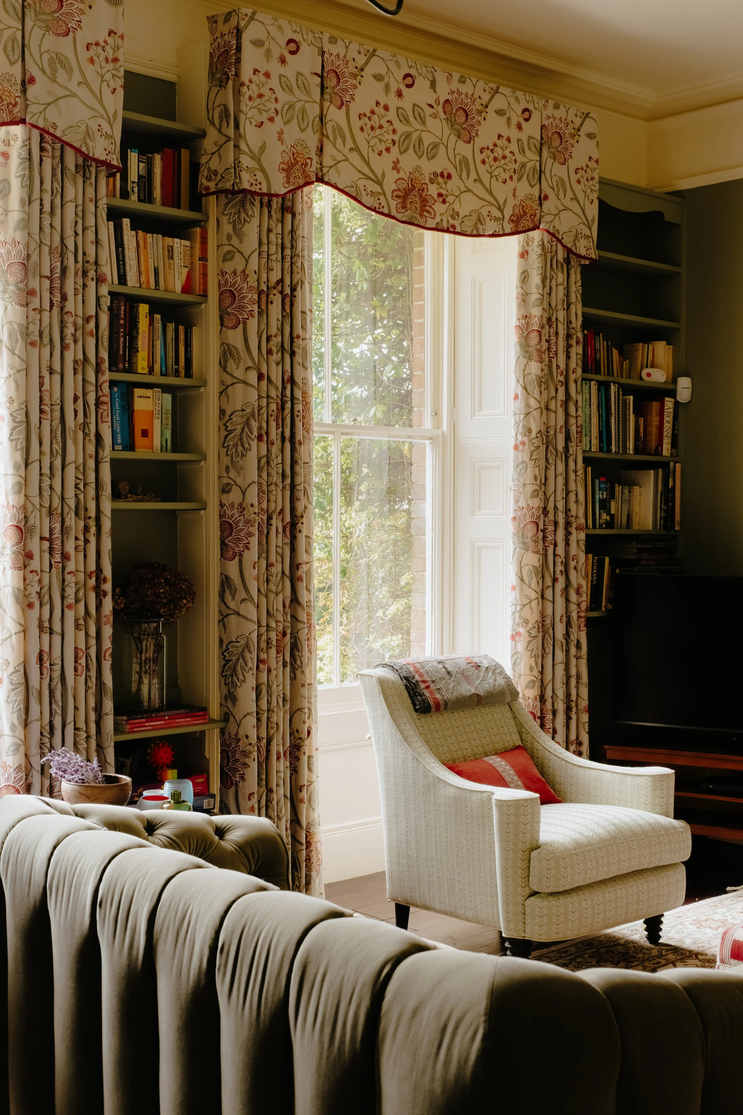 Georgian sitting room with large windows and armchair.jpg