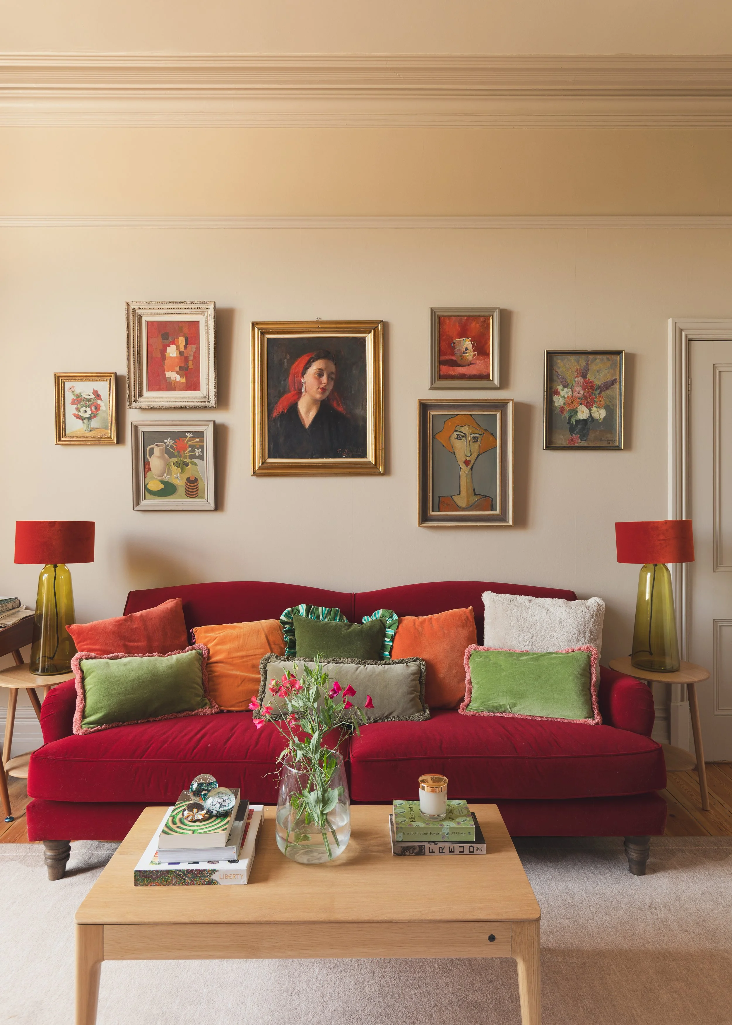 Sitting room with velvet sofa and art wall  (5).jpg