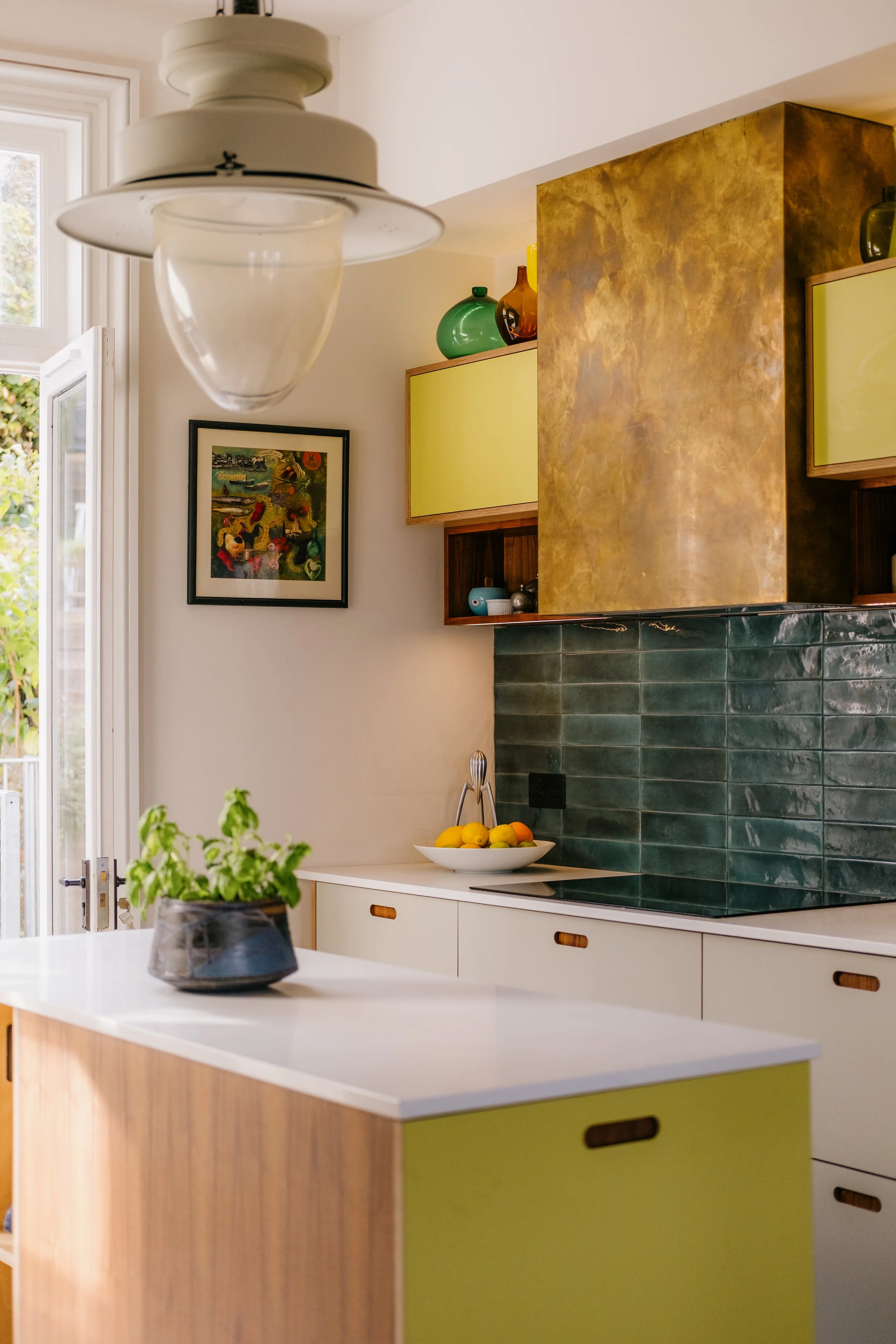 Ply and formica kitchen with brass chimney copy.jpg