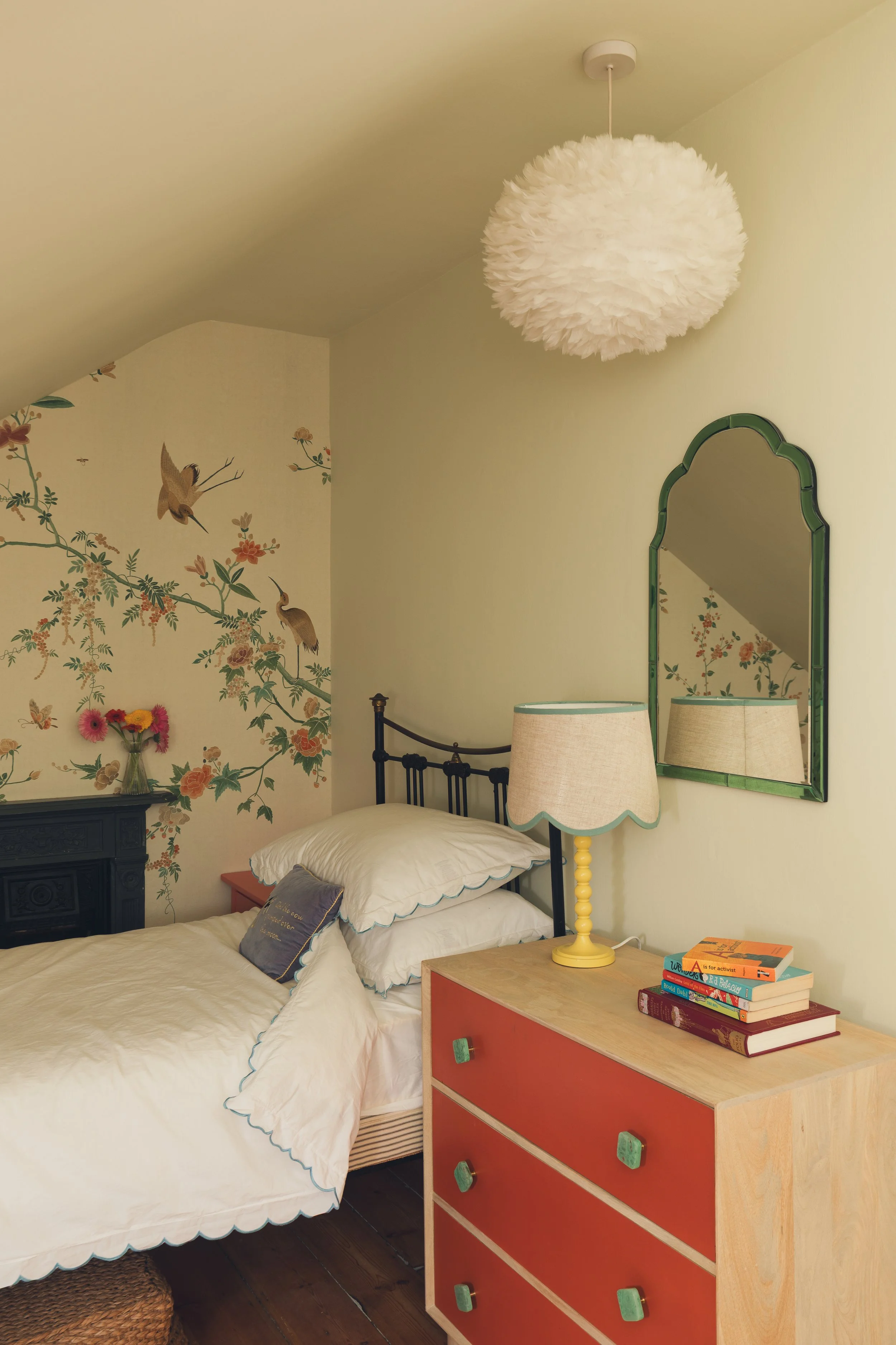 Attic bedroom with floral wallpaper..jpg