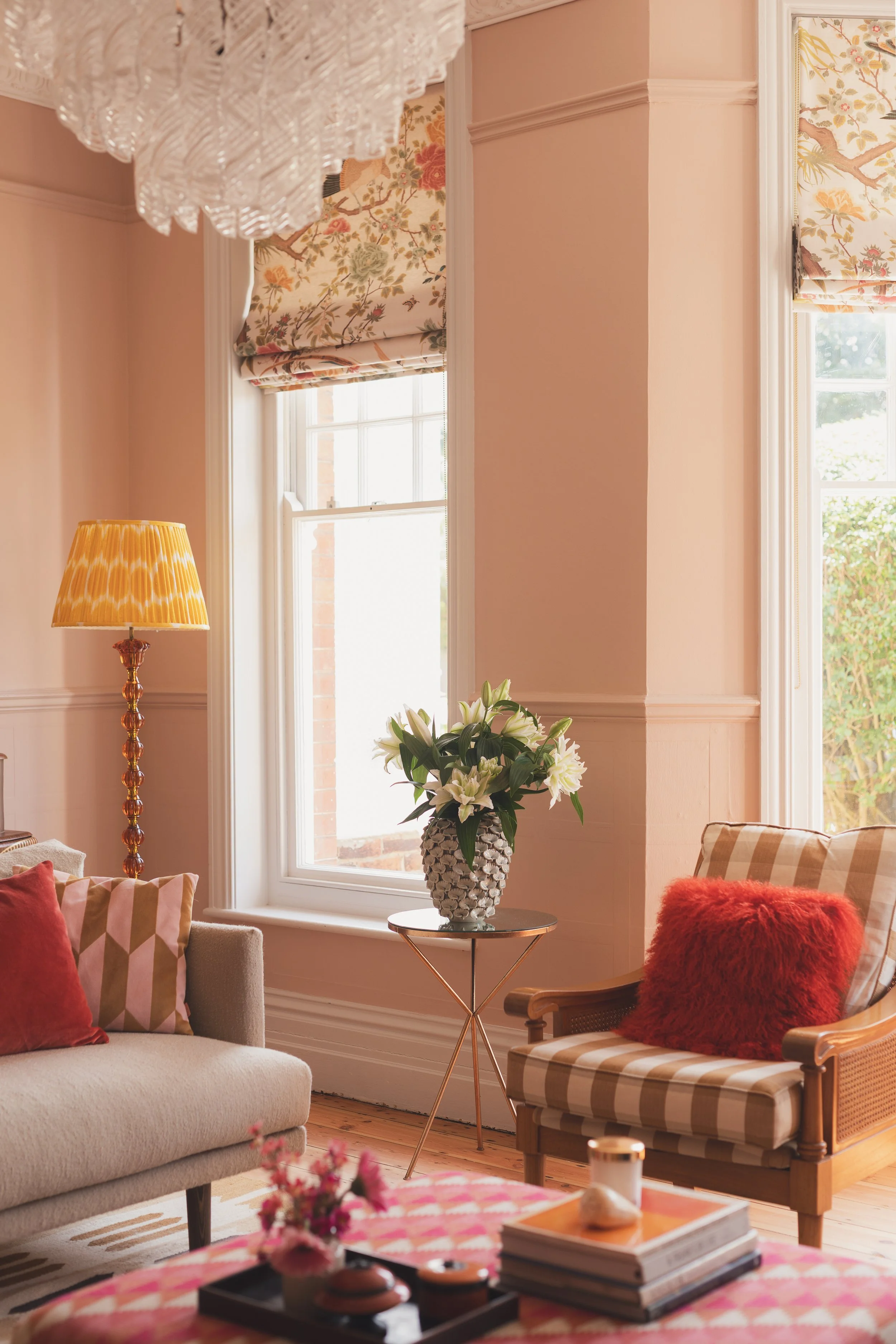 Pink Victorian sitting room with large windows.jpg
