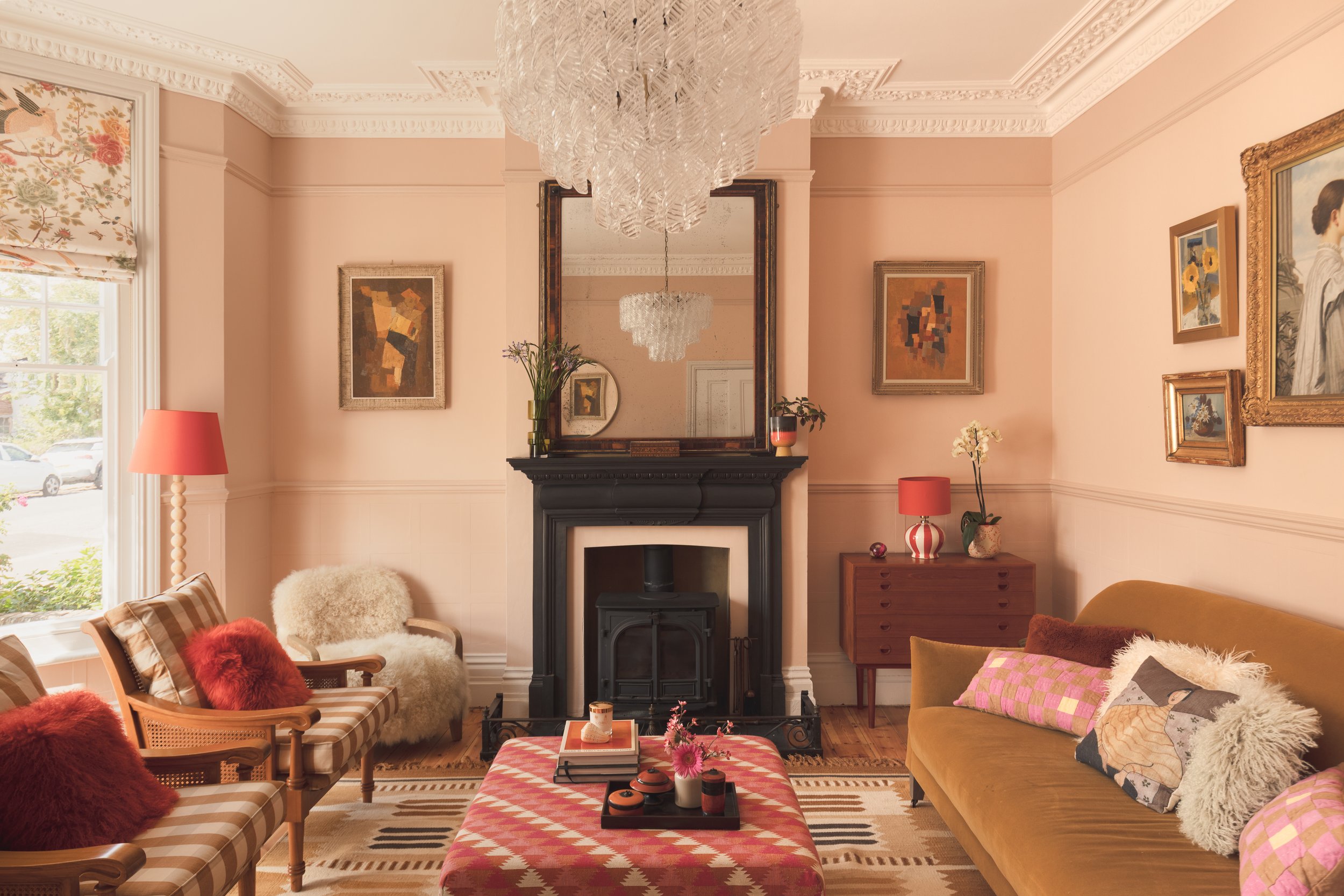 Soft pink victorian sitting room with wal art.jpg