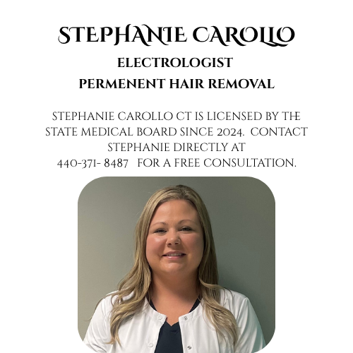 Stephanie Carollo with blonde hair smiling, wearing a white medical coat over dark clothing, standing against a plain gray background.