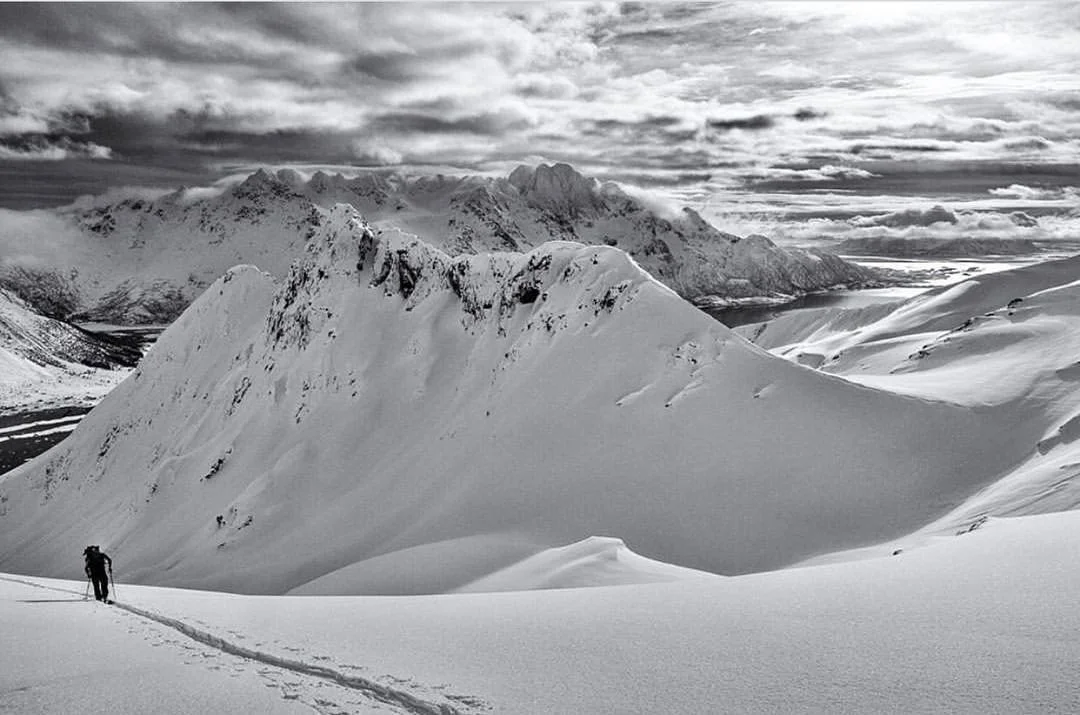 This incredible shot by @mortensteinvaag from a stellar day in #Lofoten has us craving outdoor adventures. How about you? ⠀
.⠀
.⠀
.⠀
#earnyourturns #skitouring #skiuphill #instokewetrust #skilife #skiingislife #winteriscoming #skibumlife #sendit #pow