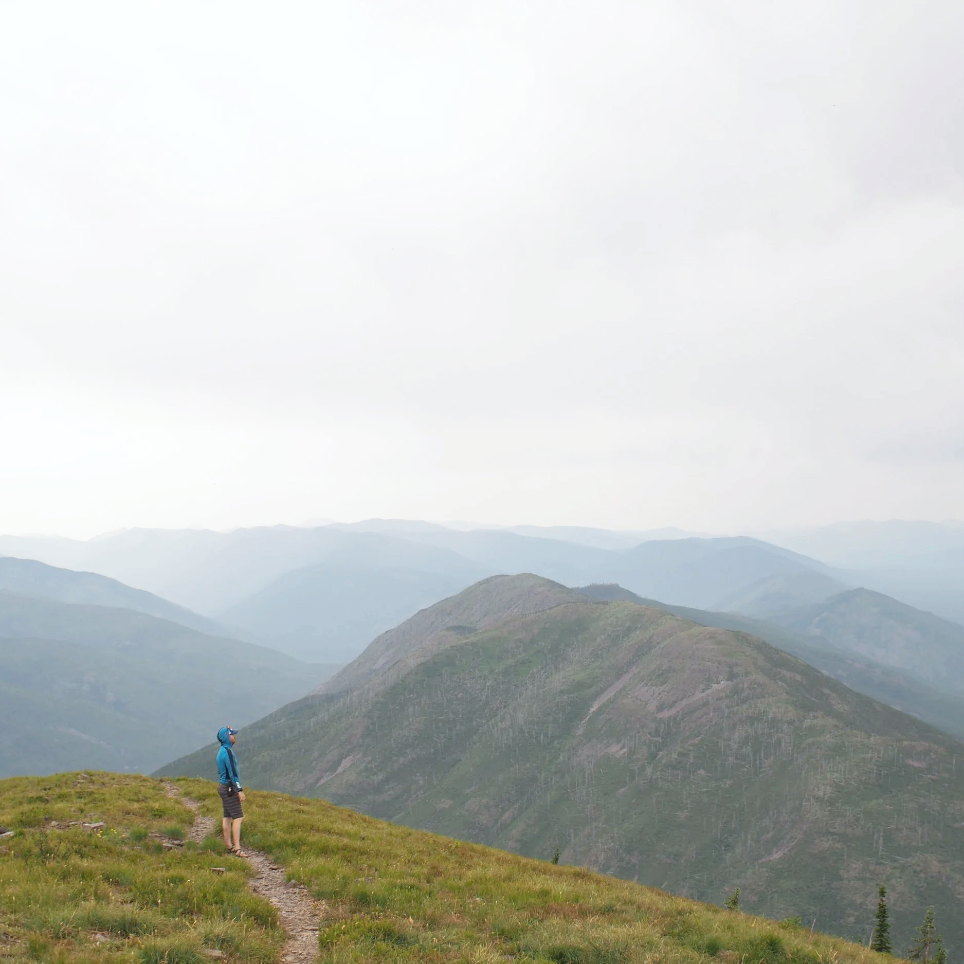 man alone on a trail