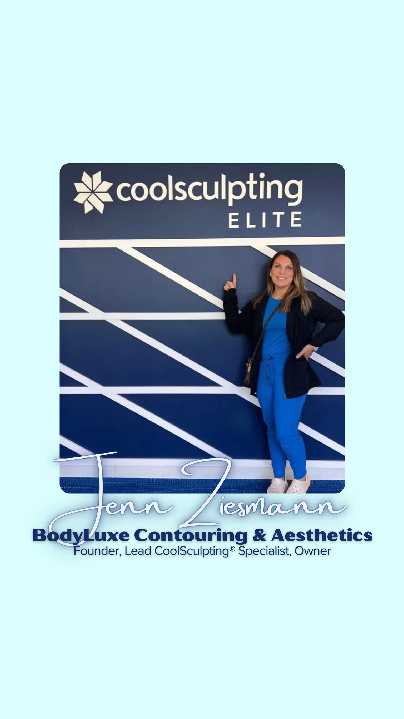 Photograph of Jenn Ziesmann standing in front of a CoolSculpting Elite sign, pointing at it, wearing blue scrubs and a black jacket, promoting BodyLuxe Contouring & Aesthetics.