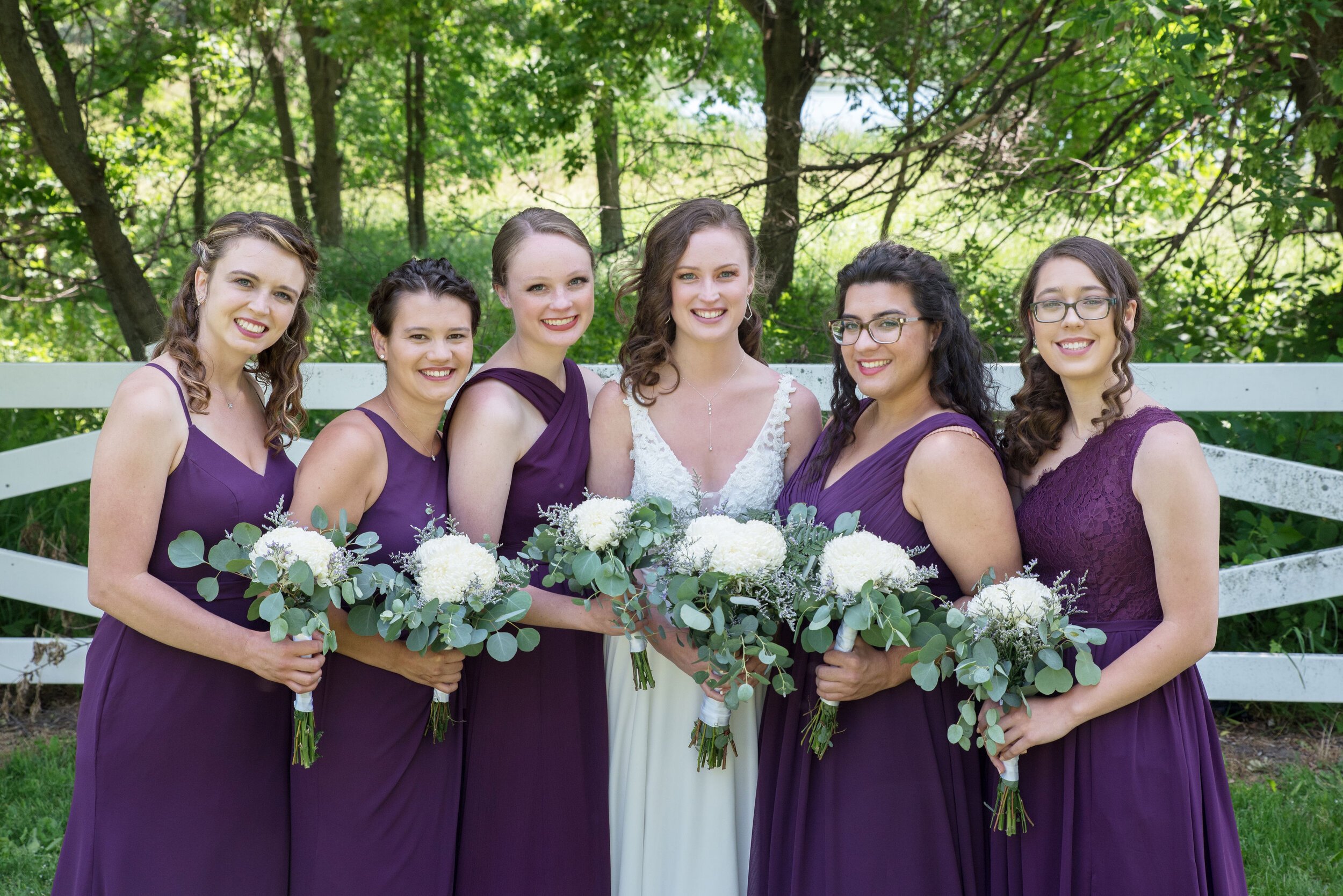 EricksonFarmsteadWeddingBrideWithBridesmaids.jpeg