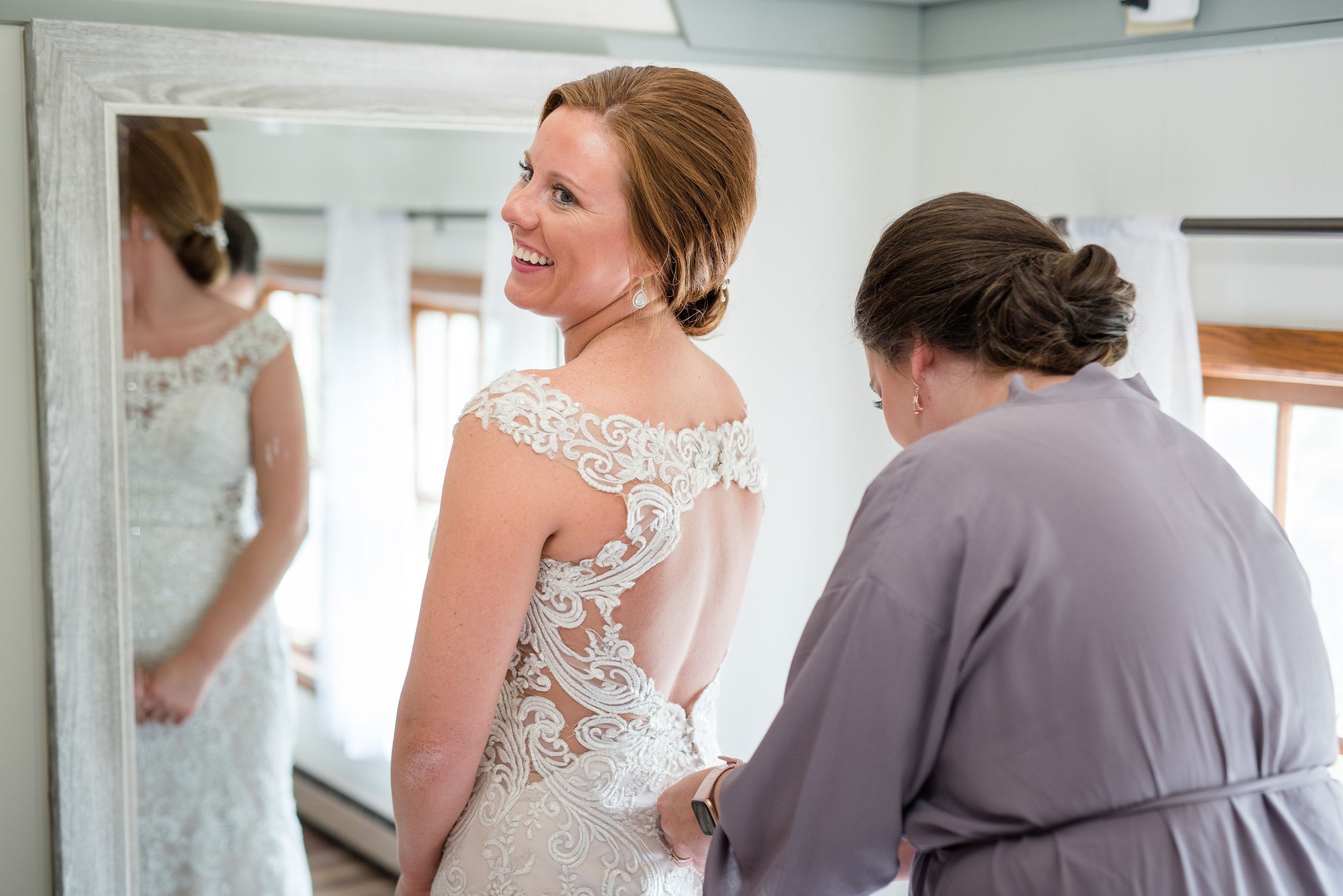 Erickson Farmstead Bride's Dress is Zipped.jpeg