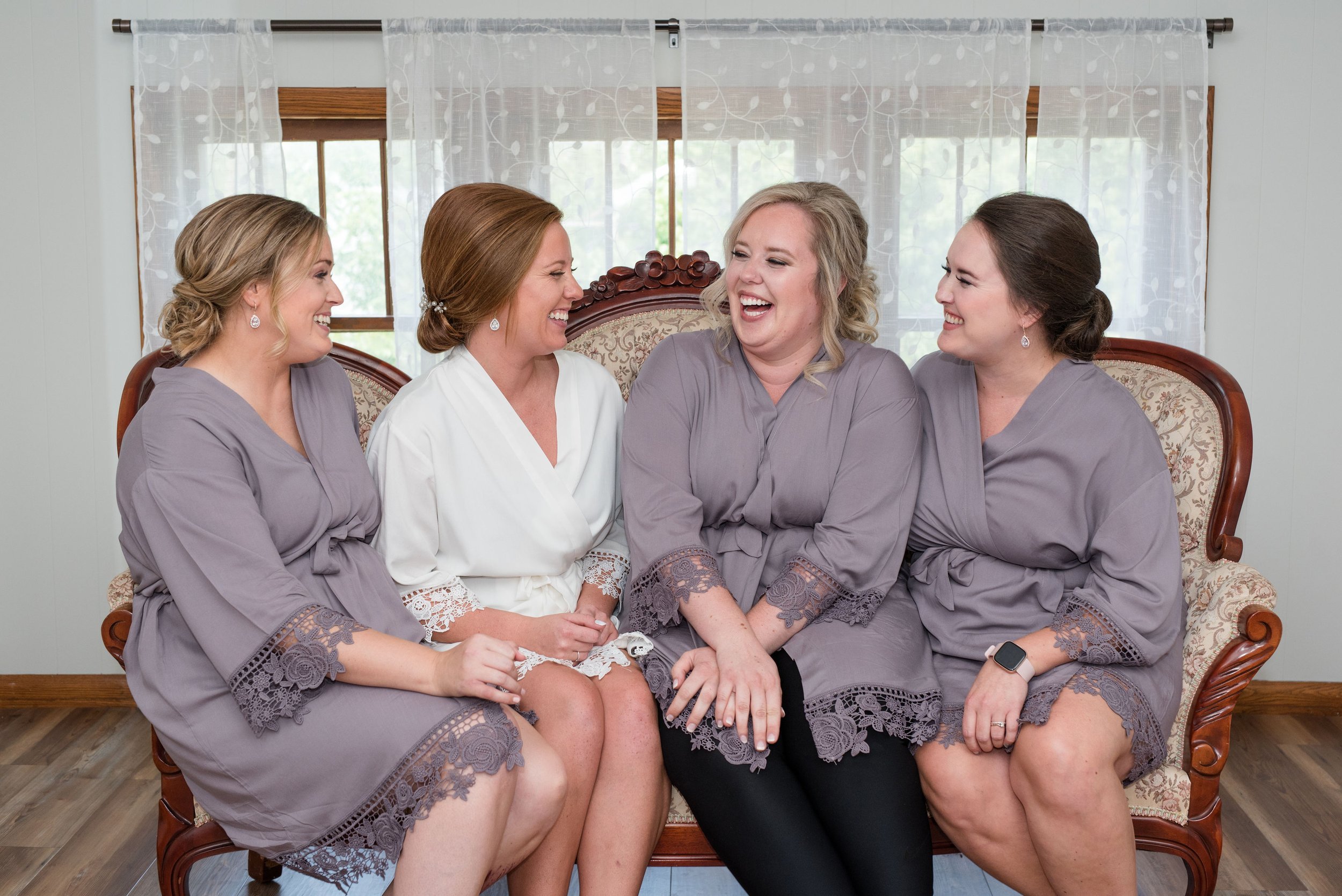 Erickson Farmstead Bride with Bridesmaids Getting Ready Robes.jpeg