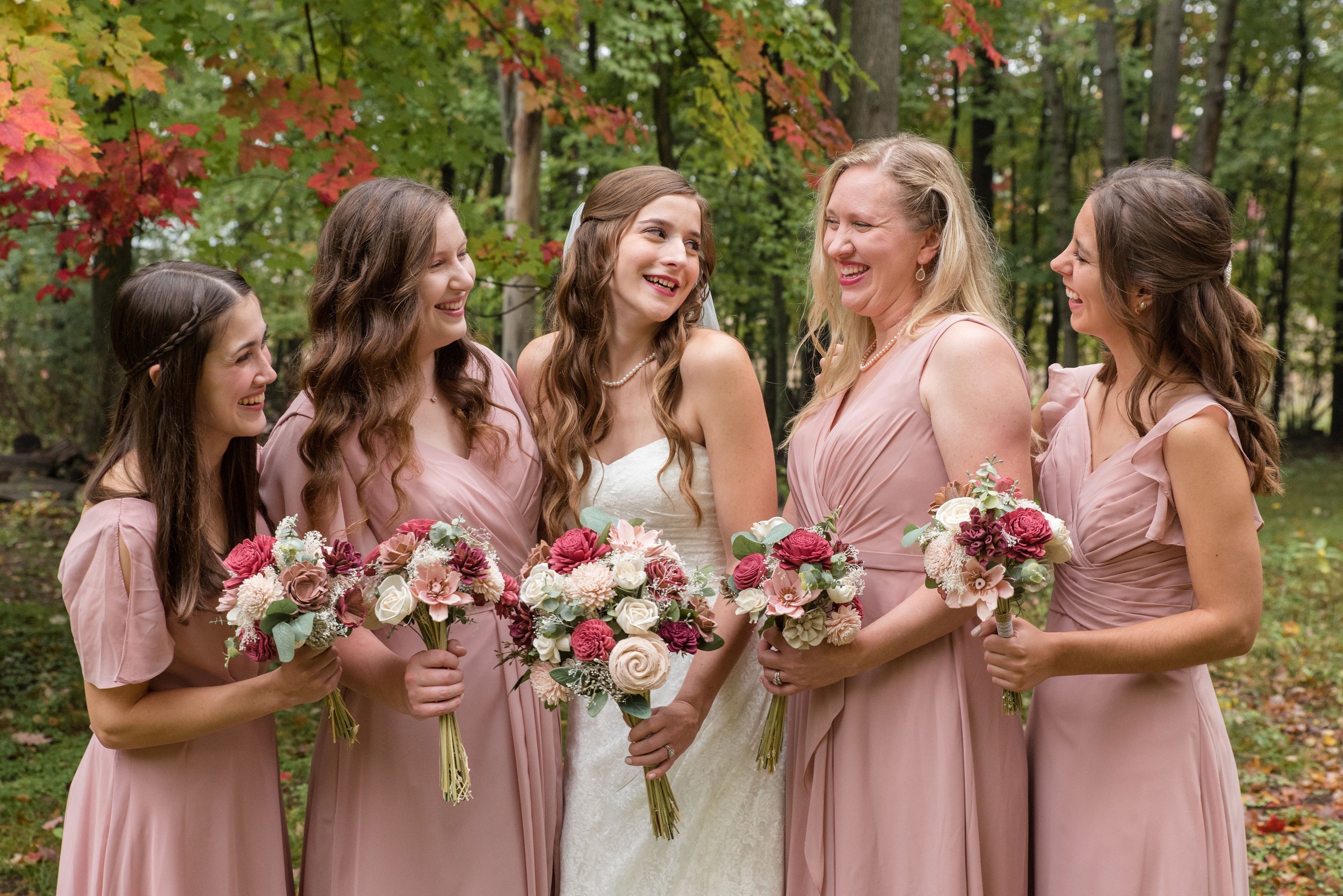 Bride with her Bridesmaids MN Fall Wedding.jpeg