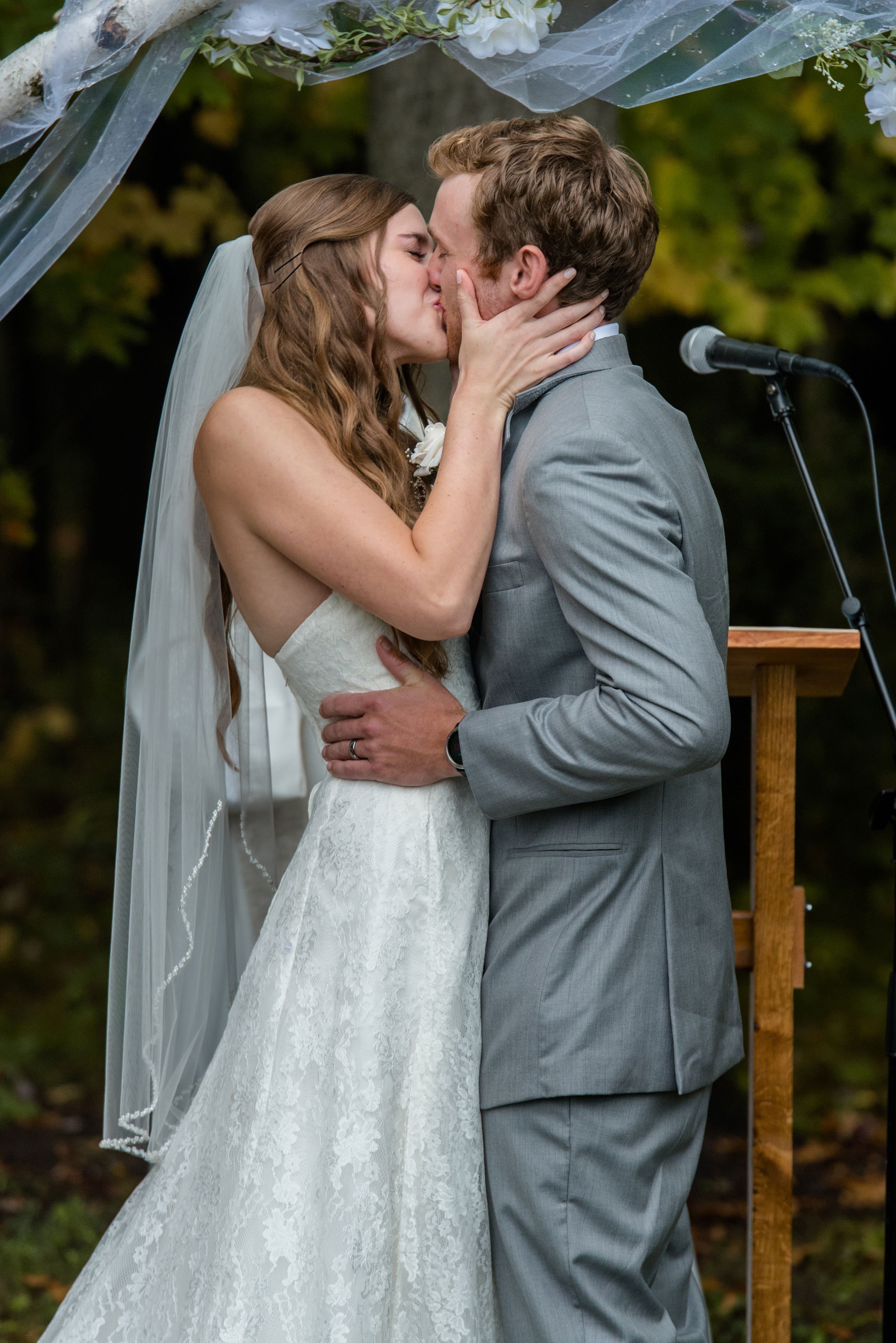 MN Backyard Wedding First Kiss.jpeg