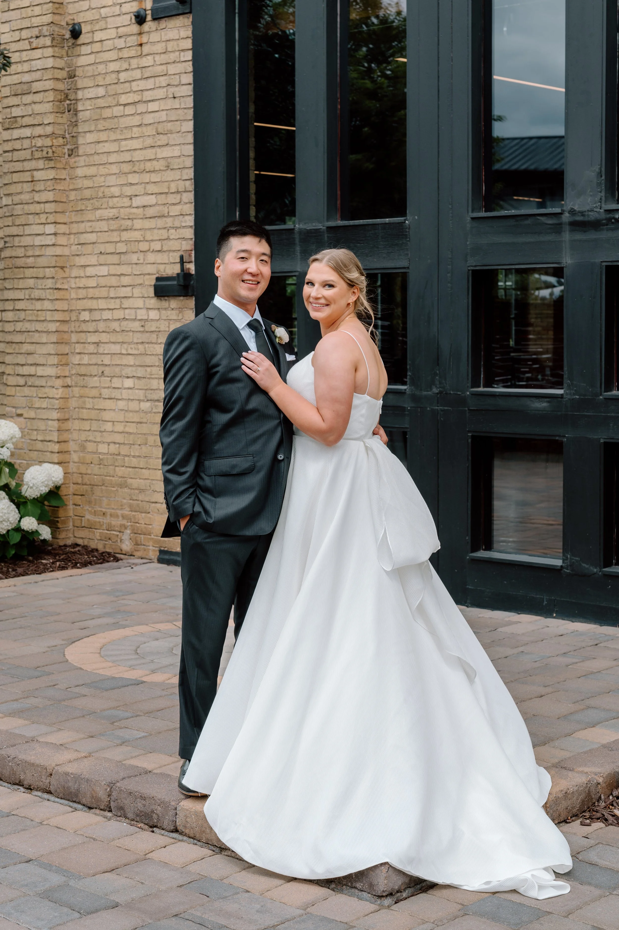 Formal outdoor portrait of bride and groom in the courtyard outside the Essence Event Center