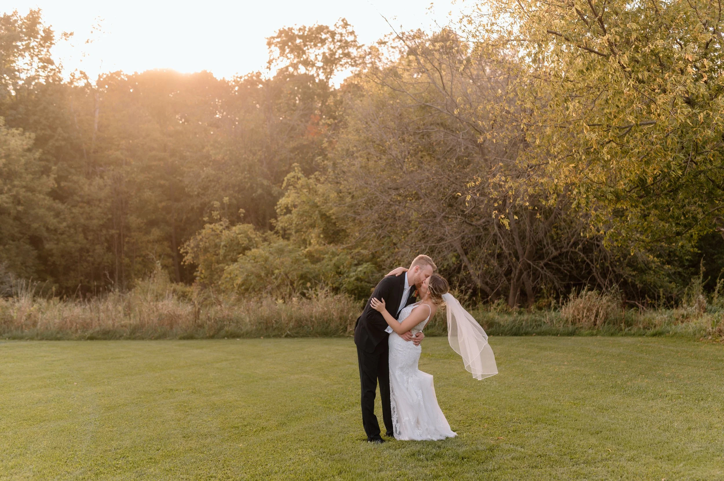 Sunset wedding photos at The Falls Weddings and Events Center in St. Croix Falls, WI