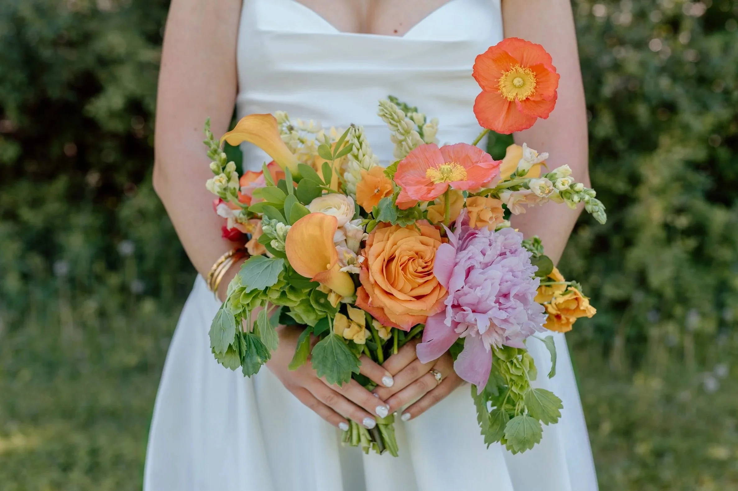 Cheerful and flirty flowers by Ergo Floral featured on a sunny summer wedding day at Belle Ame Vineyard; Minneapolis wedding photographer