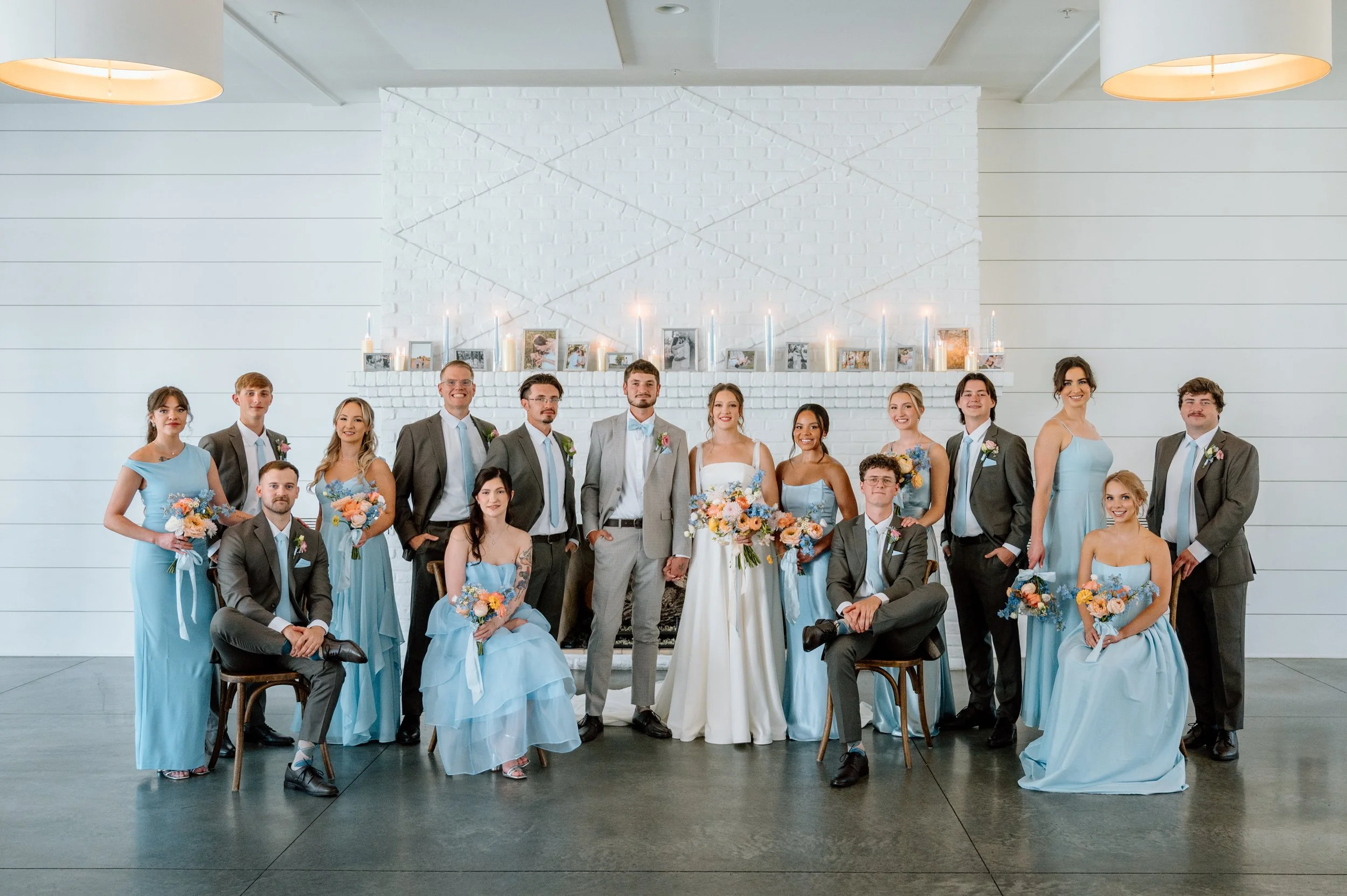 Formal wedding party image inside the fireside room at the Hutton House