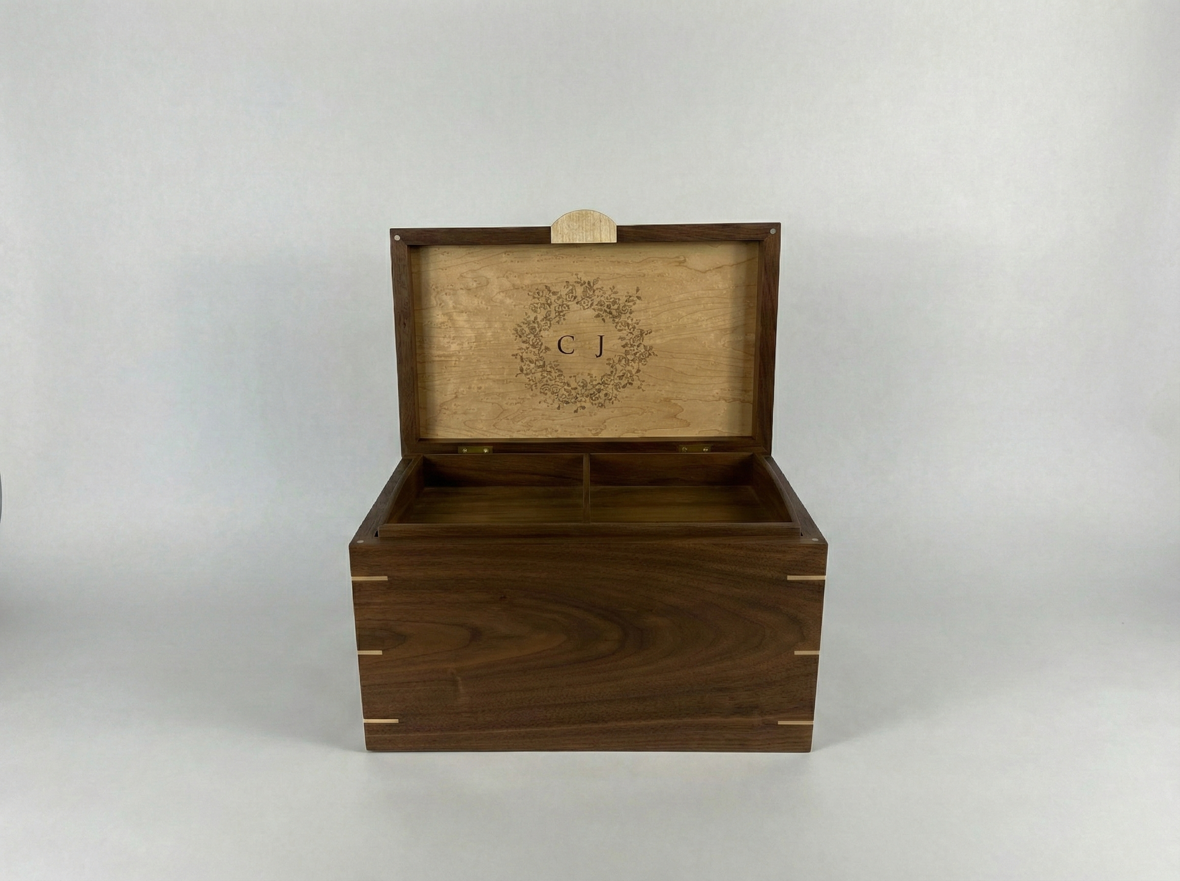 Walnut box with maple lid and engraved logo and initials on the inside of the lid