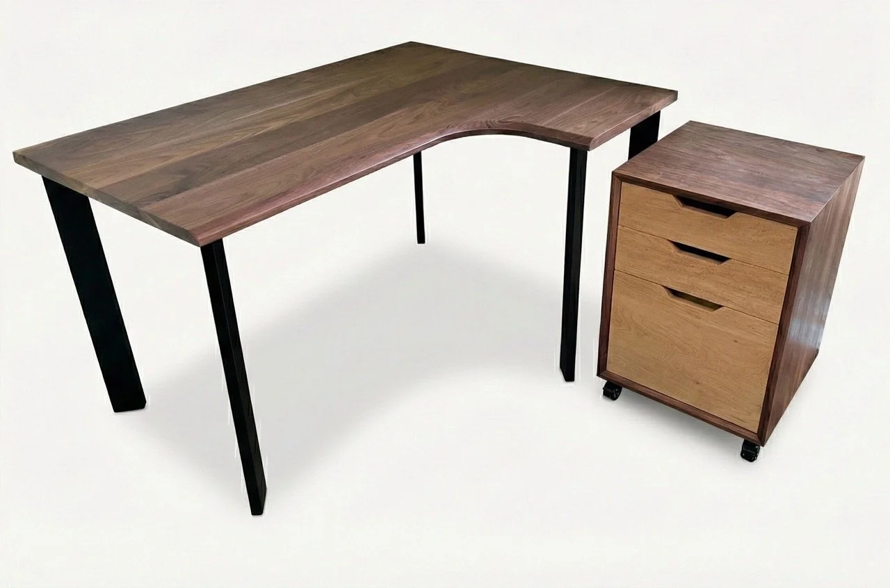 Walnut desk with black steel legs; walnut filing cabinet with maple drawers