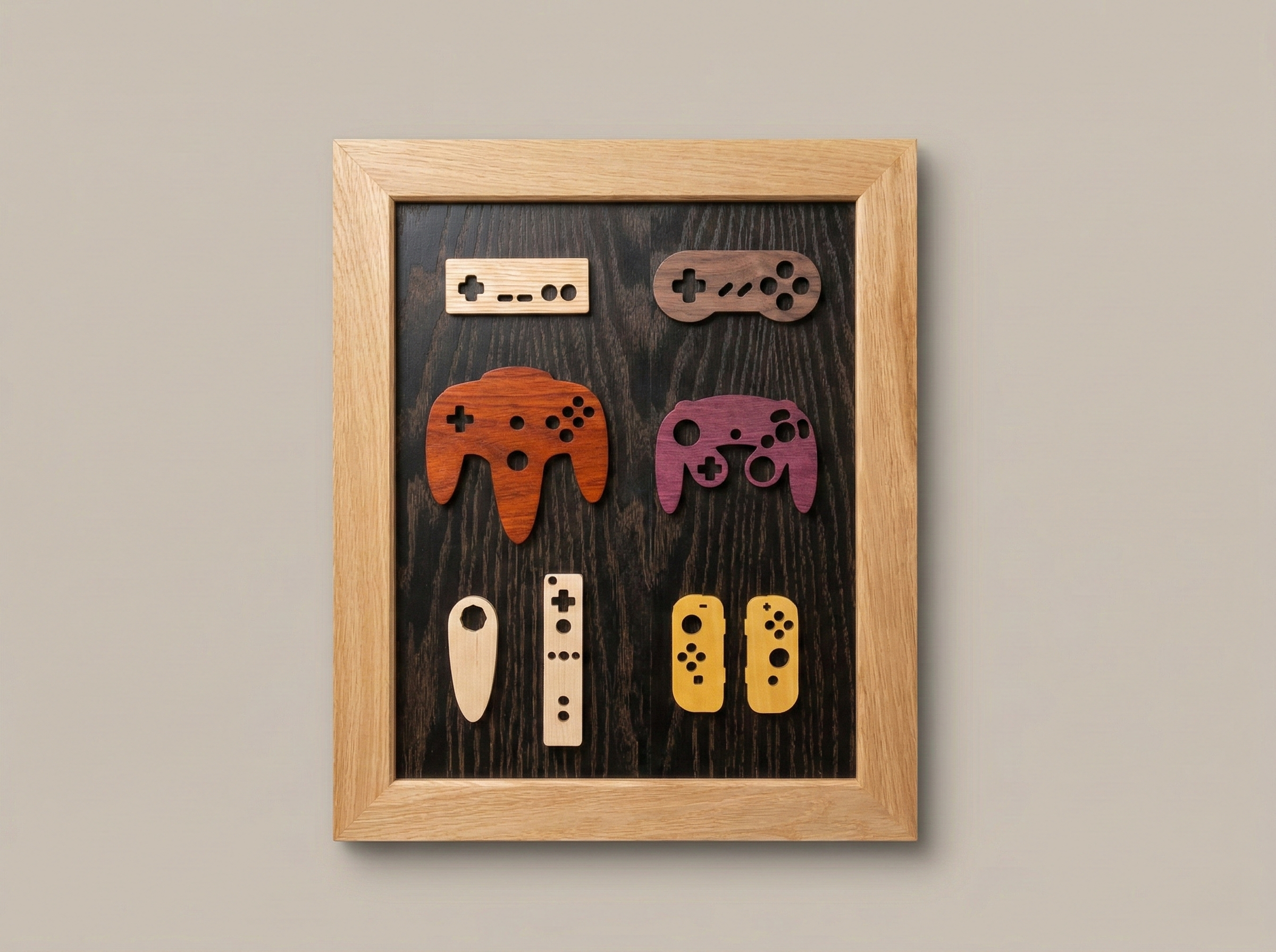 Classic video game console art made of different species and colors of wood, in a white oak frame on a black background