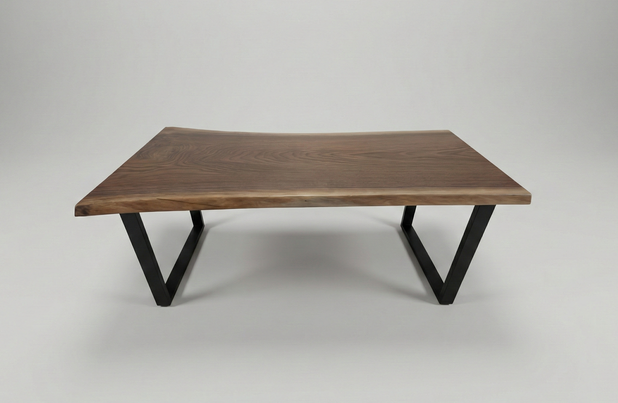 Live-edge walnut desk with black steel legs