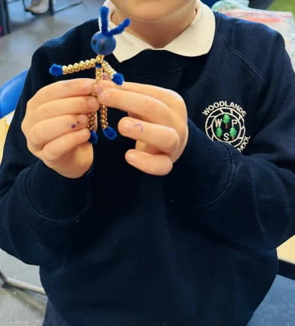 bead character made by pupil in 1-2-1 sessions
