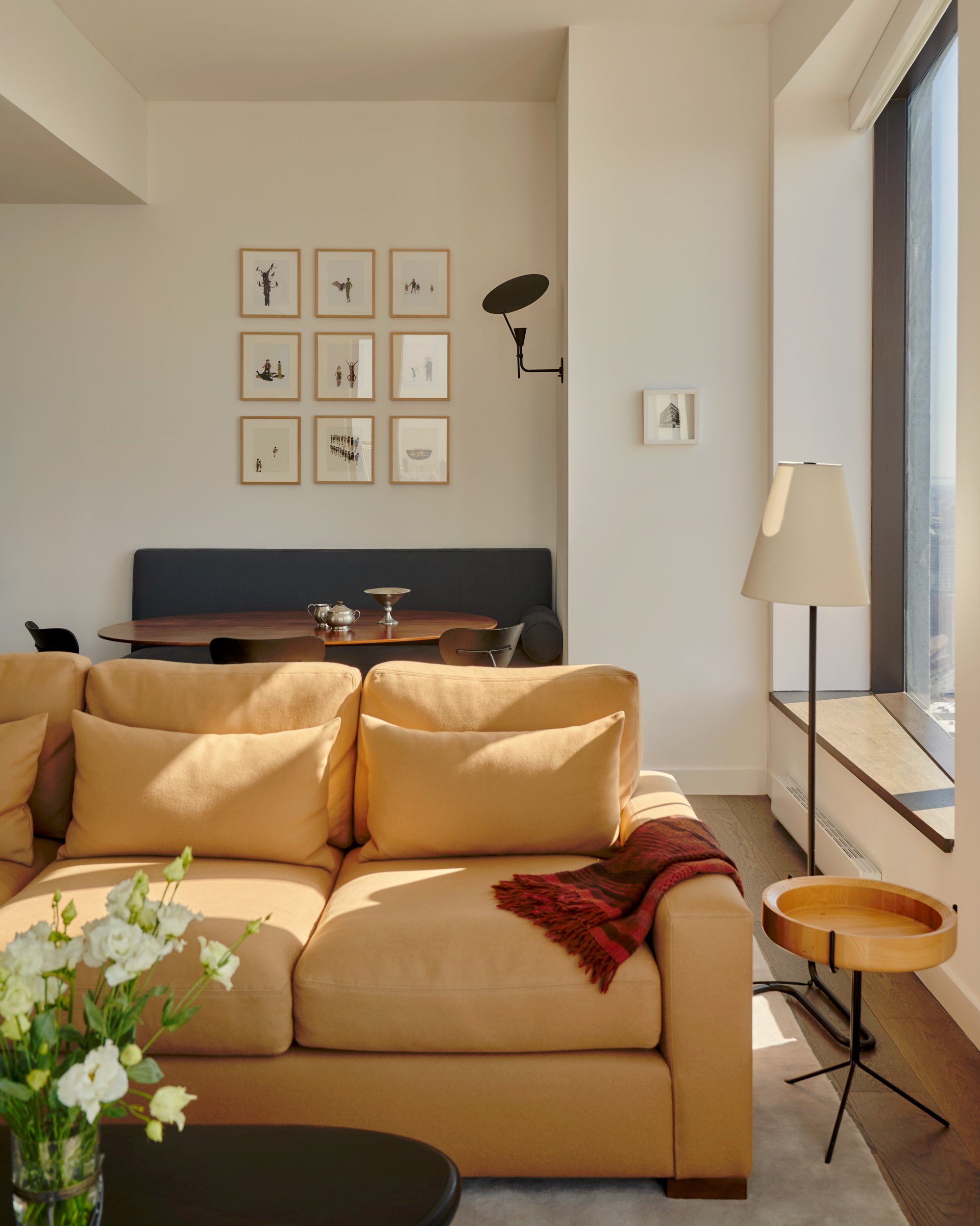A view of the dining area featuring art work by Marcel Dzama. Interior Design by Gennett Studio.