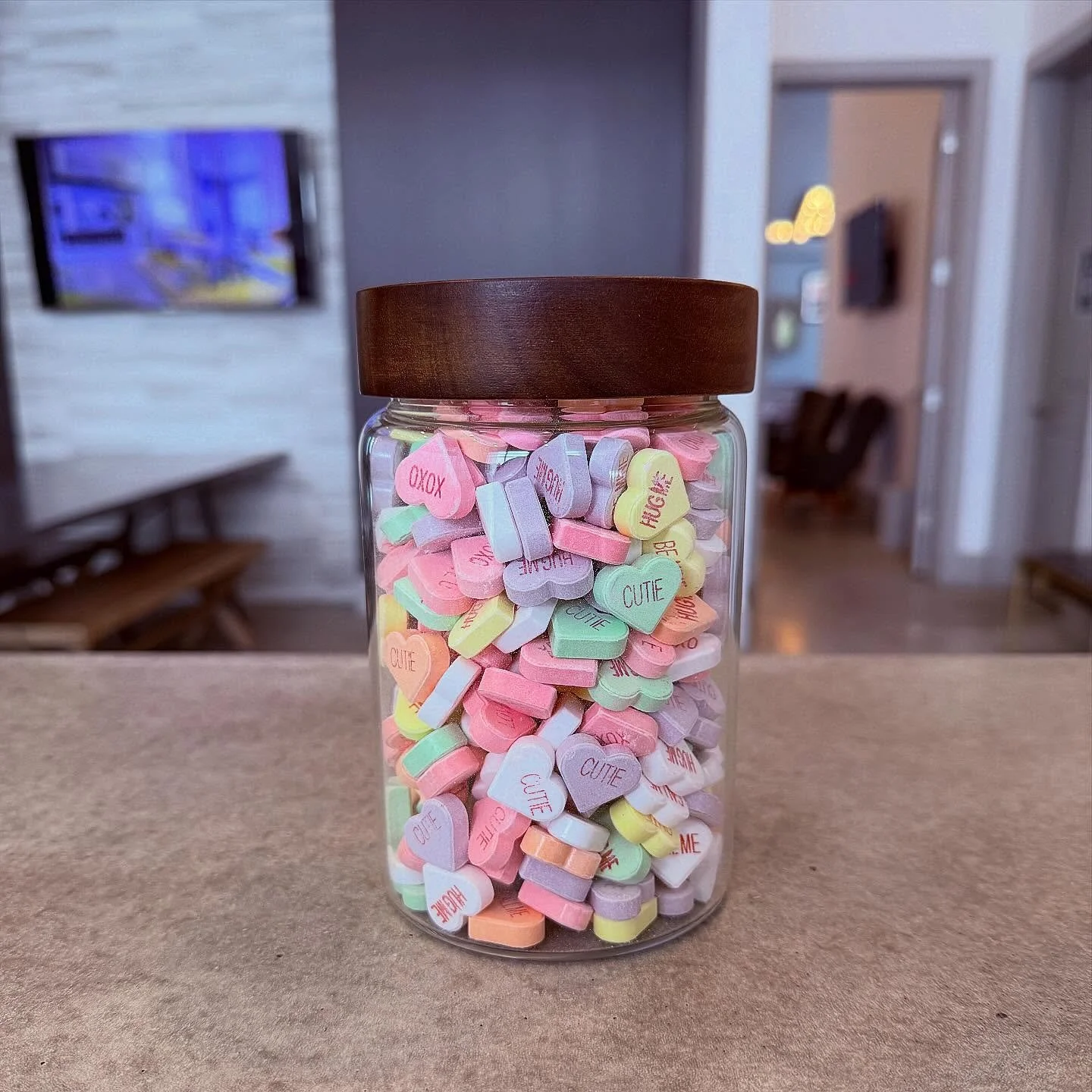 #WinItWednesday 💝✨

Stop by the office today or tomorrow and take a sweet guess 🍬
How many conversation hearts are in this jar? 💕

The closest (or exact!) guess wins a $50 gift card to treat your Valentine (or yourself 👀) to a cozy Date Night 💌?