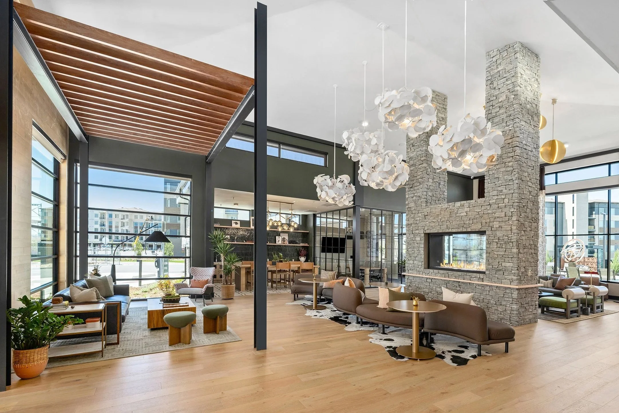 Clubhouse and Co-Work Seating and Tables with Specialty Acoustical Lighting in Denver, CO