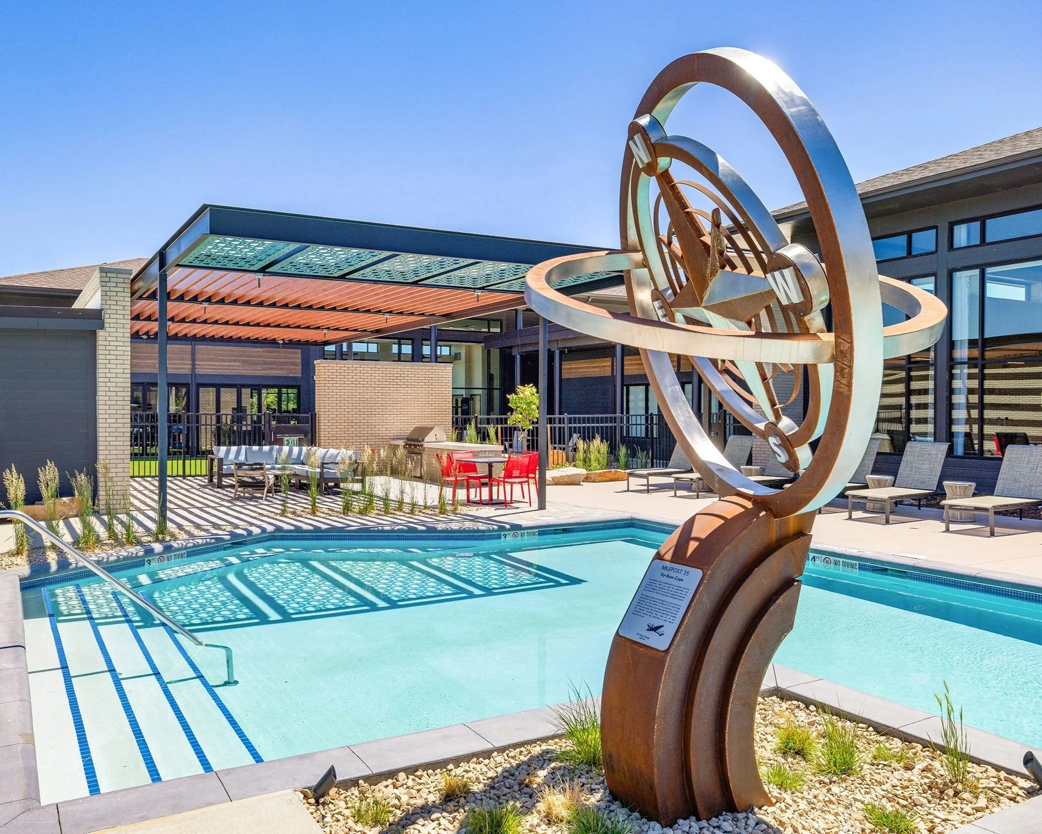 Exterior Pool with Sculpture and Seating in Denver, CO