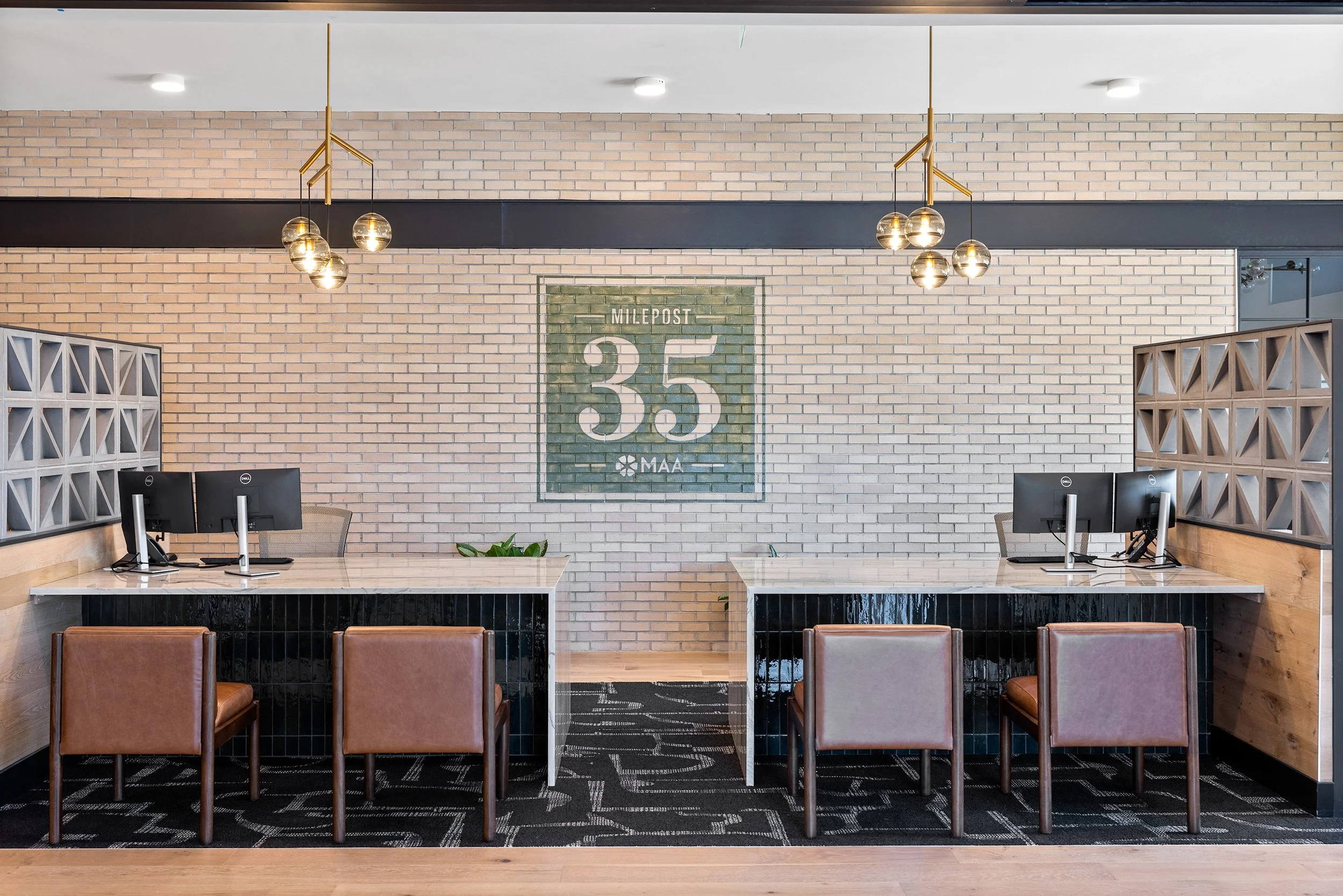Leasing Office with Desk and Guest Seating in Denver, CO