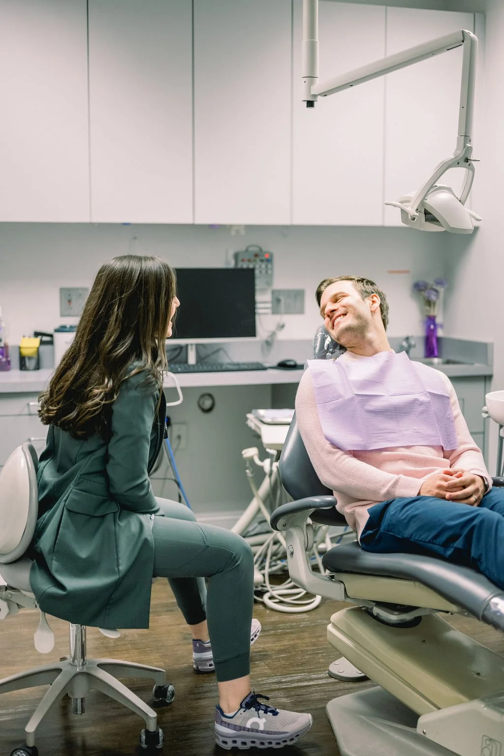 conservative dentistry: picture of Dr. D'Elia (dentist) explaining a treatment plan to a male patient.