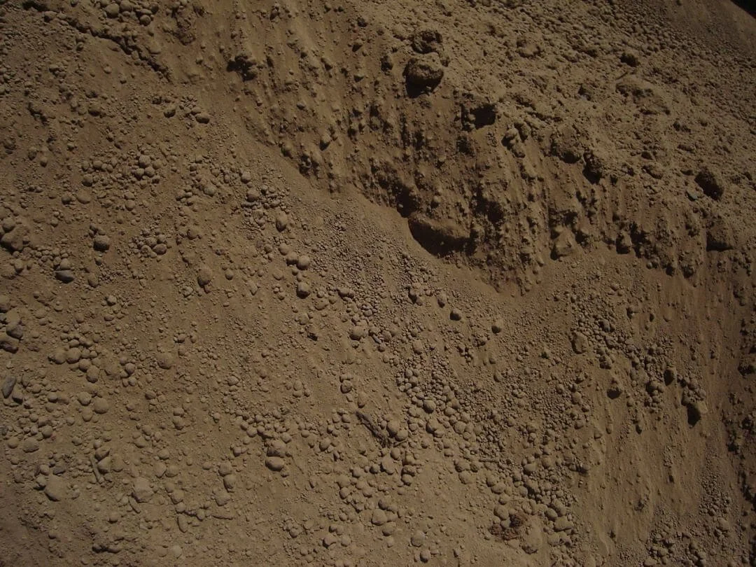Photo of finely screened rich top soil from Action Excavation.