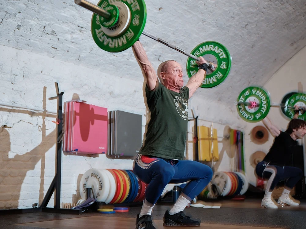 A man doing Olympic Weightlifting at Classical Barbell.