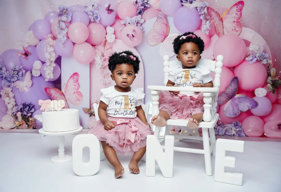 Baby milestone photoshoot with twin girls butterfly-themed first birthday in Chicago - Filaneyka photo studio